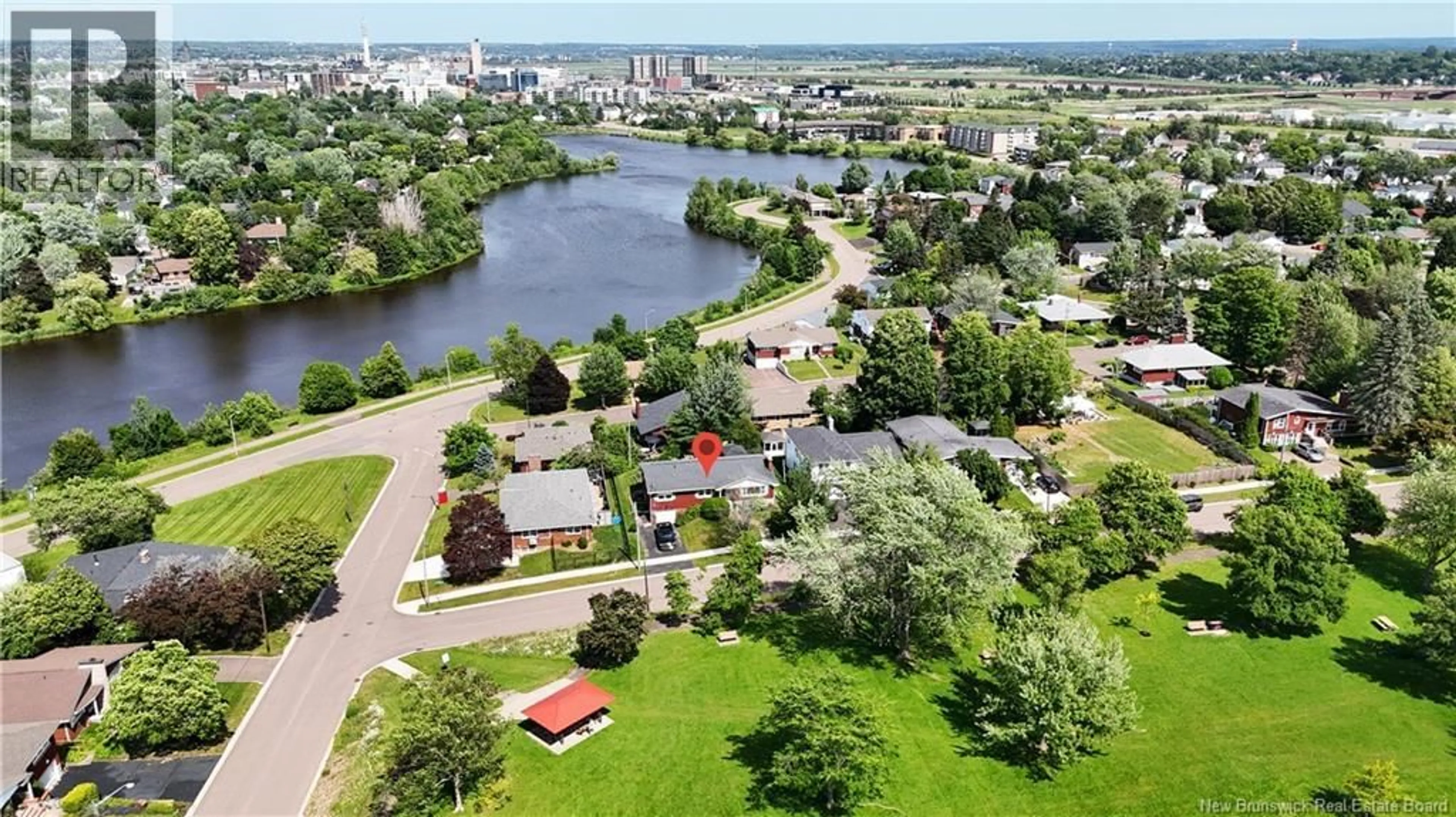 A pic from outside/outdoor area/front of a property/back of a property/a pic from drone, water/lake/river/ocean view for 127 CORONATION DRIVE, Moncton New Brunswick E1E2X5