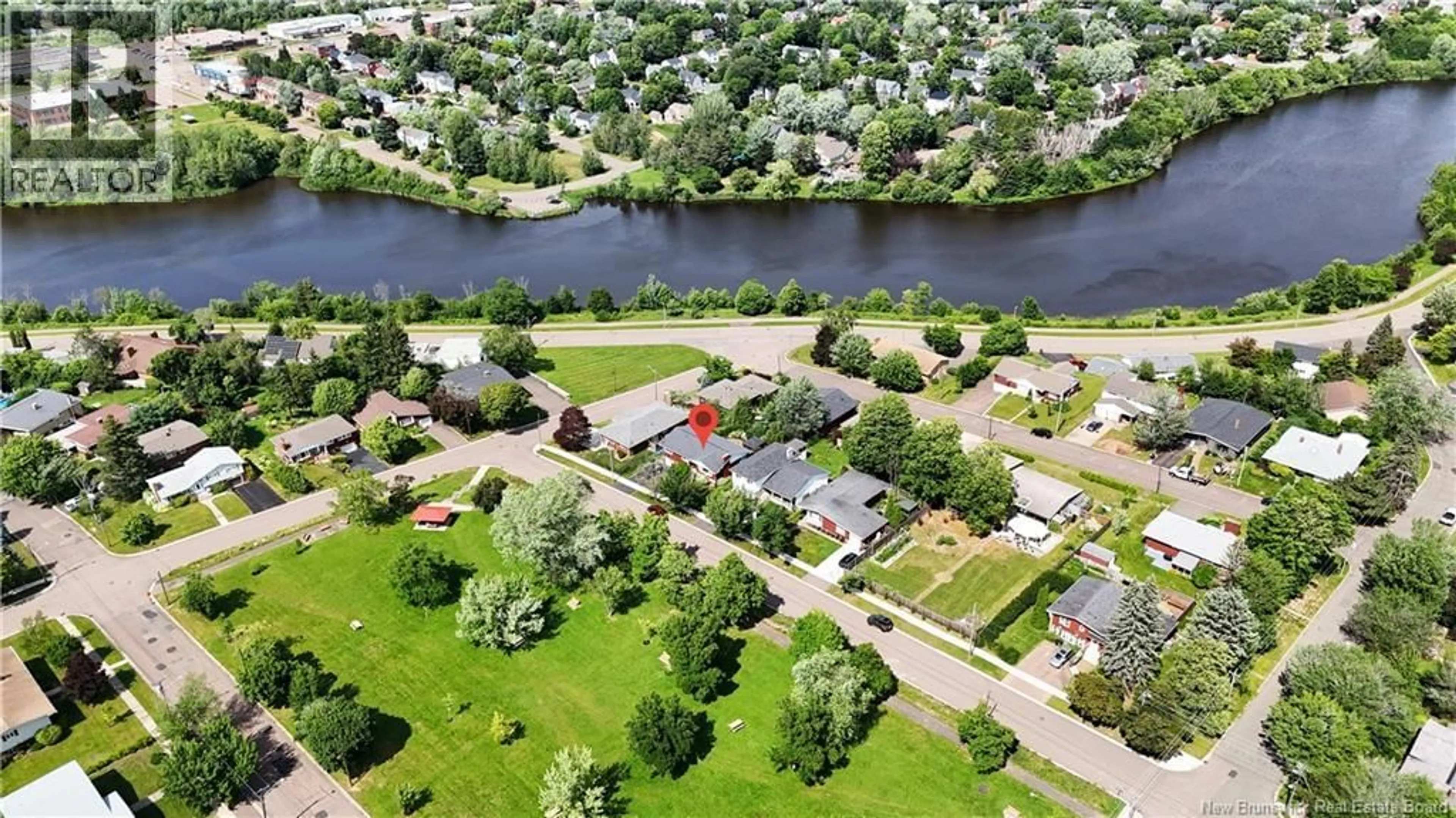 A pic from outside/outdoor area/front of a property/back of a property/a pic from drone, water/lake/river/ocean view for 127 CORONATION DRIVE, Moncton New Brunswick E1E2X5