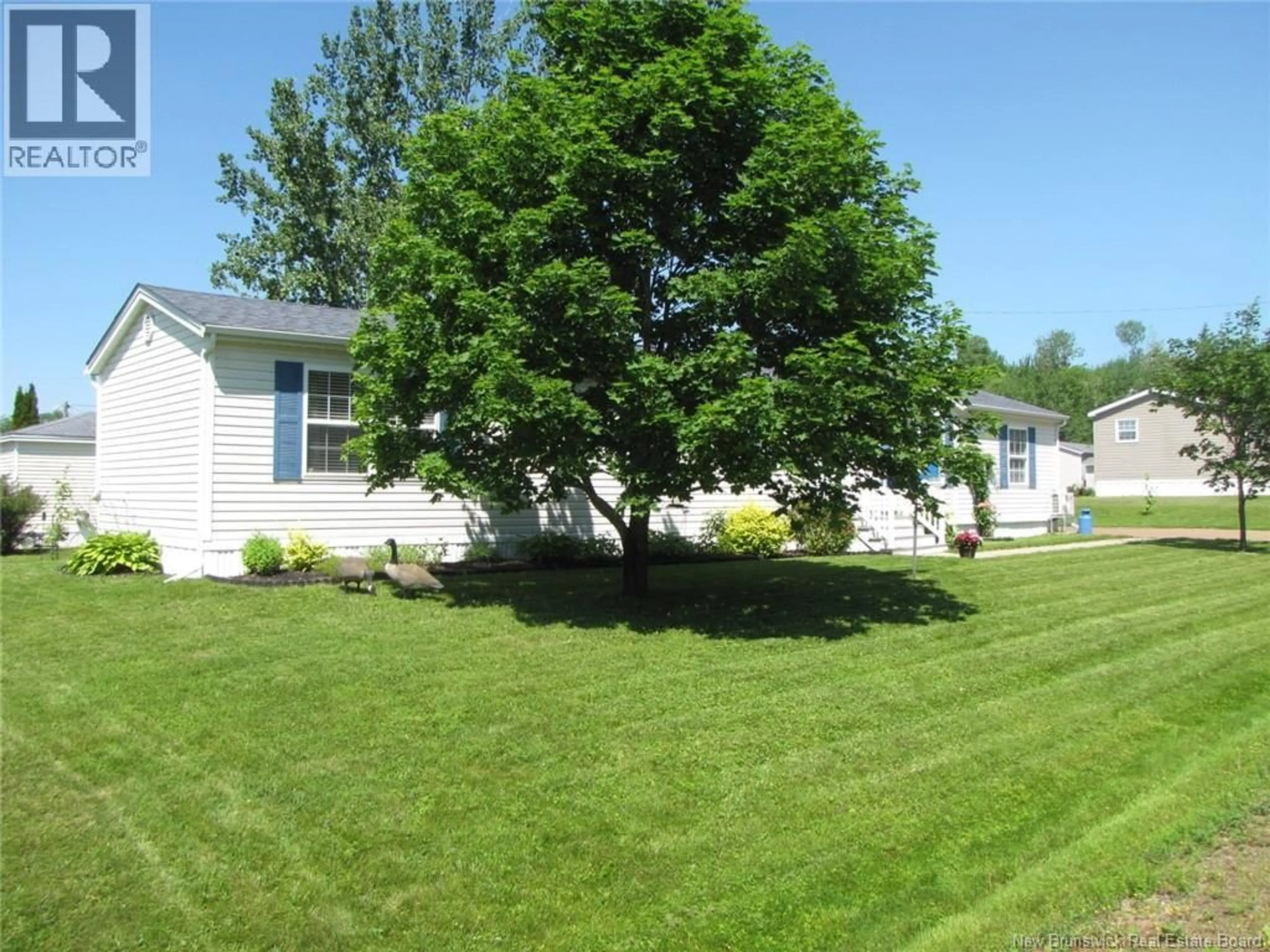 Home with vinyl exterior material, street for 26 ASPENWOOD STREET, Moncton New Brunswick E1H3E8