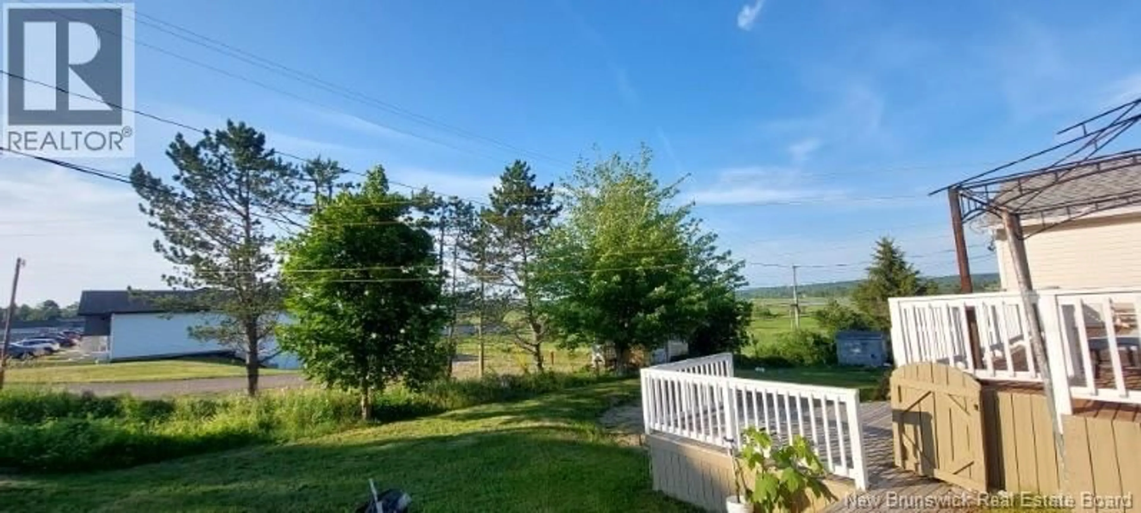 A pic from outside/outdoor area/front of a property/back of a property/a pic from drone, water/lake/river/ocean view for 105 ARTHUR STREET, Memramcook New Brunswick E4K1Z7