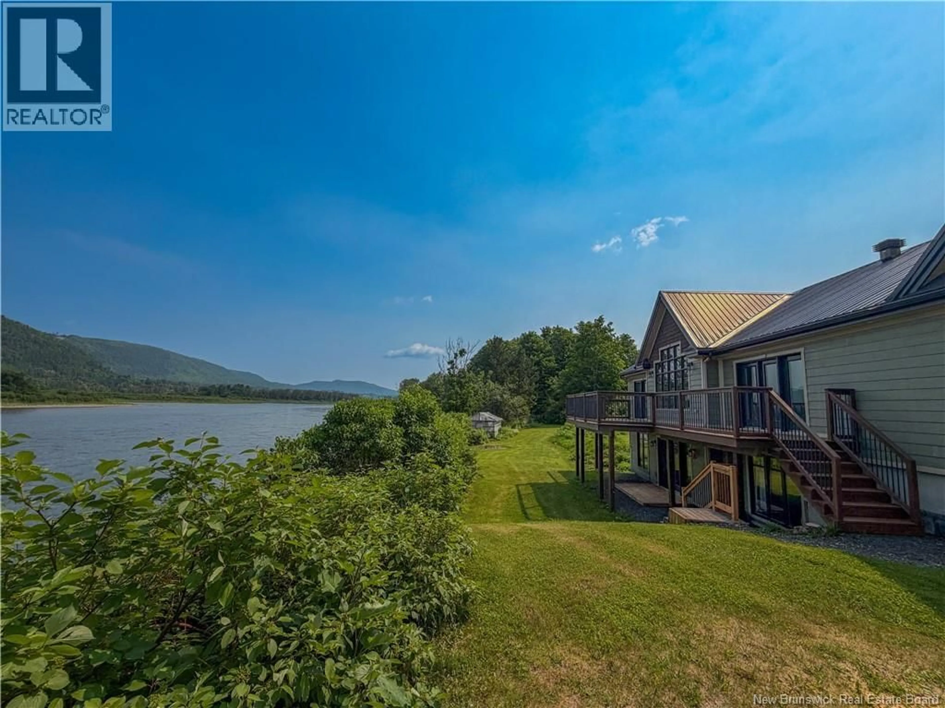 A pic from outside/outdoor area/front of a property/back of a property/a pic from drone, water/lake/river/ocean view for 33658 ROUTE 11, Flatlands New Brunswick E3N0A5