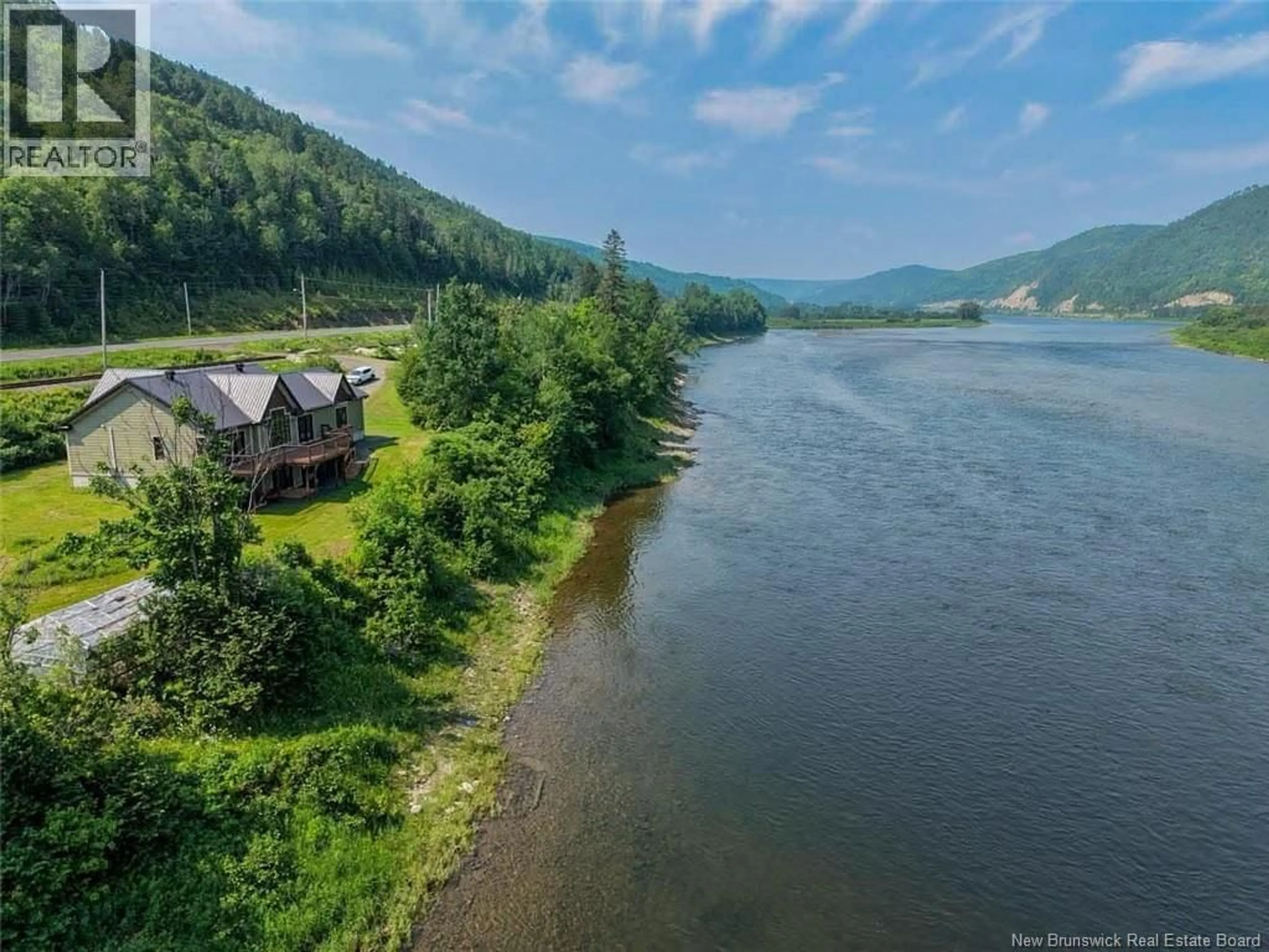 A pic from outside/outdoor area/front of a property/back of a property/a pic from drone, water/lake/river/ocean view for 33658 ROUTE 11, Flatlands New Brunswick E3N0A5