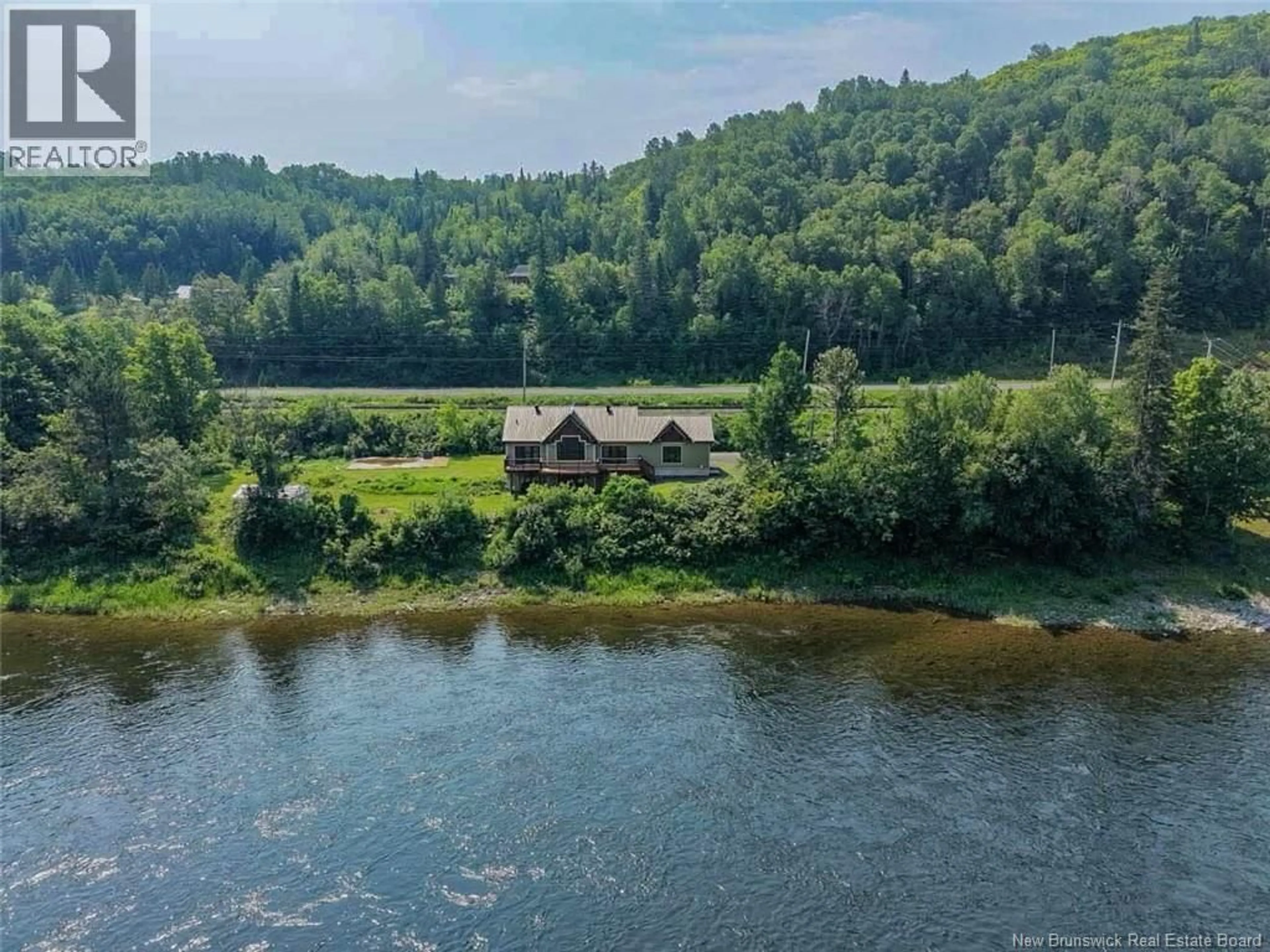A pic from outside/outdoor area/front of a property/back of a property/a pic from drone, water/lake/river/ocean view for 33658 ROUTE 11, Flatlands New Brunswick E3N0A5