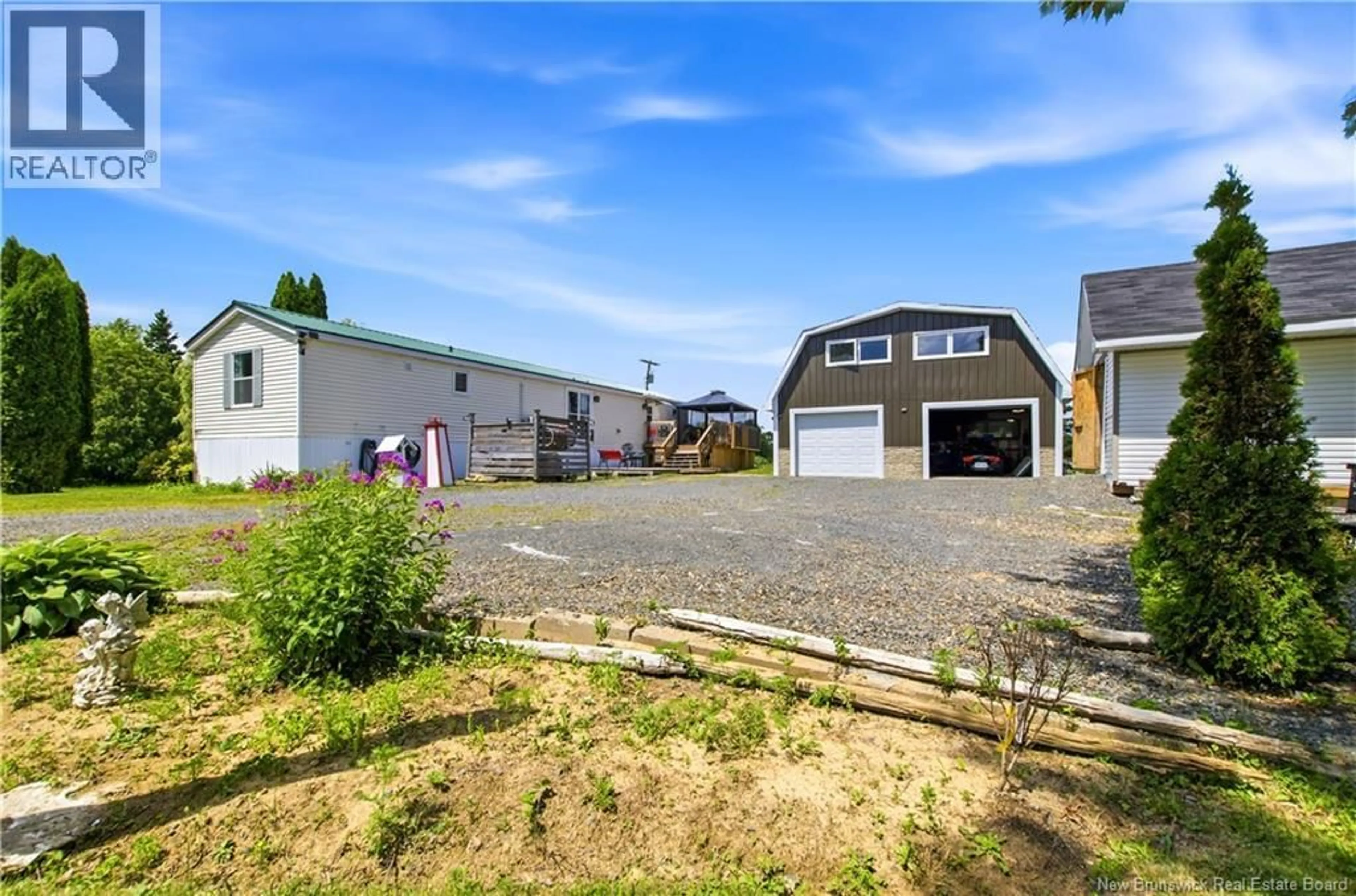 A pic from outside/outdoor area/front of a property/back of a property/a pic from drone, street for 1711 ROUTE 105, Maugerville New Brunswick E3A8J4