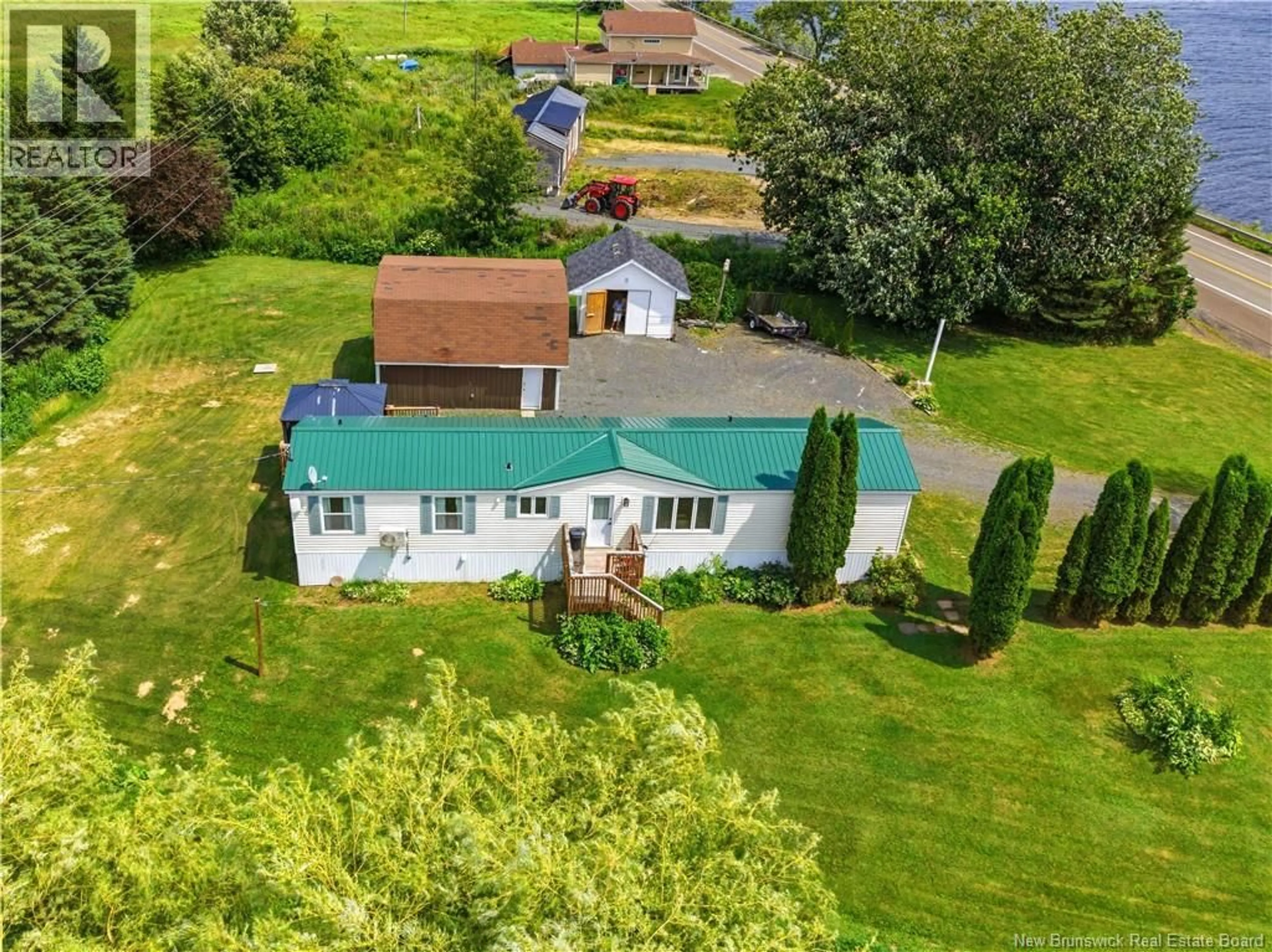 A pic from outside/outdoor area/front of a property/back of a property/a pic from drone, water/lake/river/ocean view for 1711 ROUTE 105, Maugerville New Brunswick E3A8J4