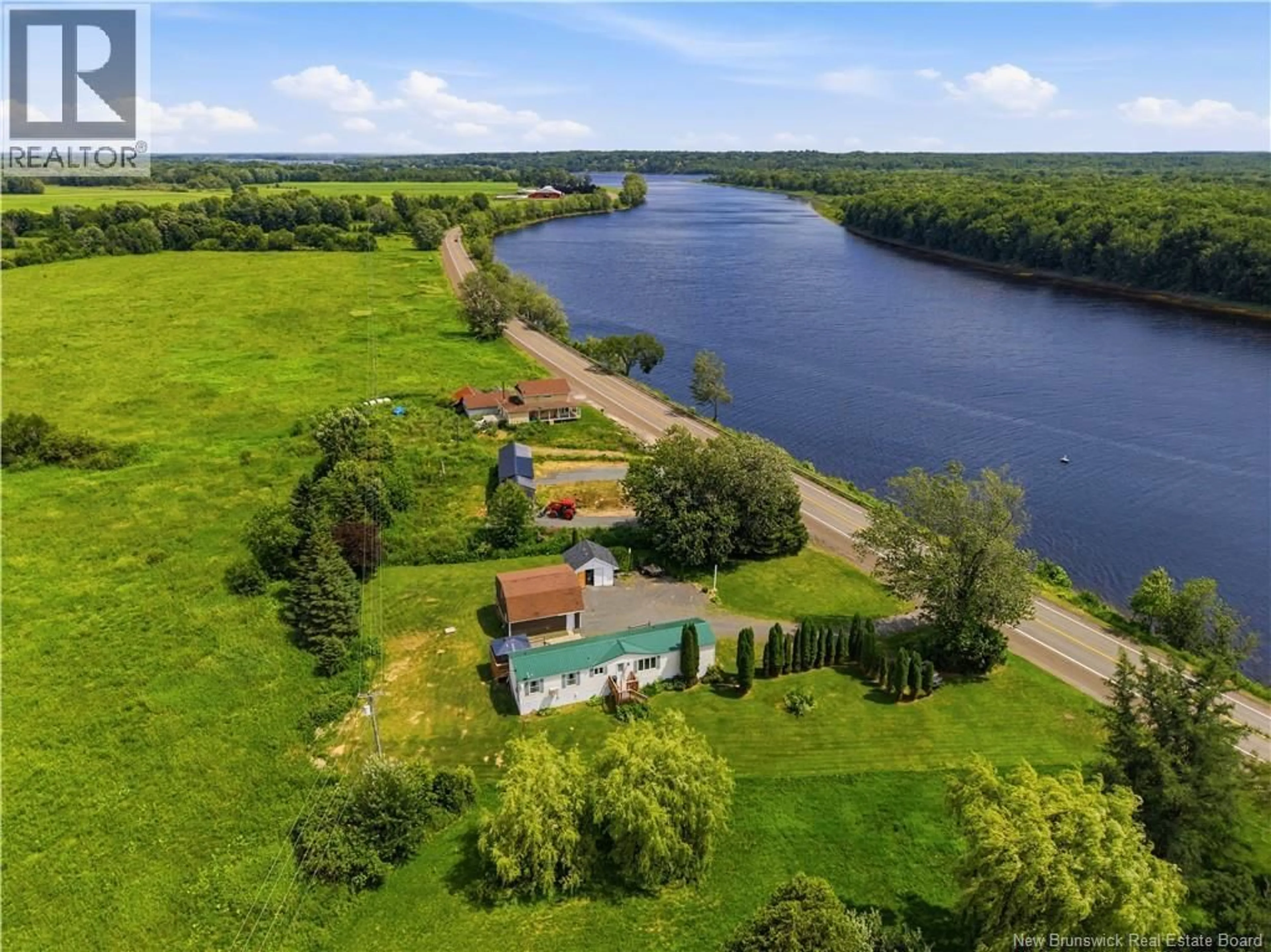 A pic from outside/outdoor area/front of a property/back of a property/a pic from drone, water/lake/river/ocean view for 1711 ROUTE 105, Maugerville New Brunswick E3A8J4