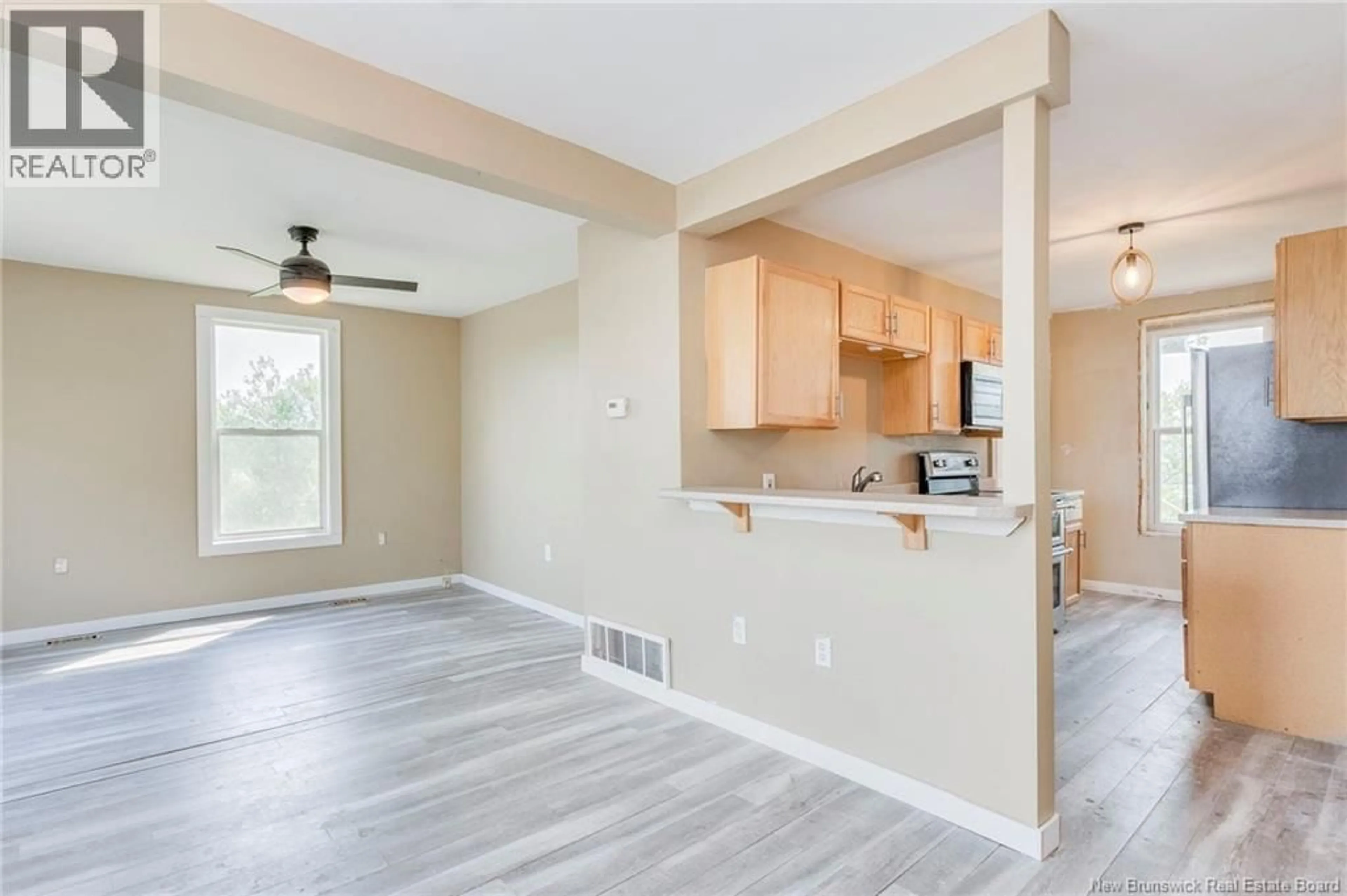 Open concept kitchen, wood/laminate floor for 425 DOUGLAS AVENUE, Saint John New Brunswick E2K1E7