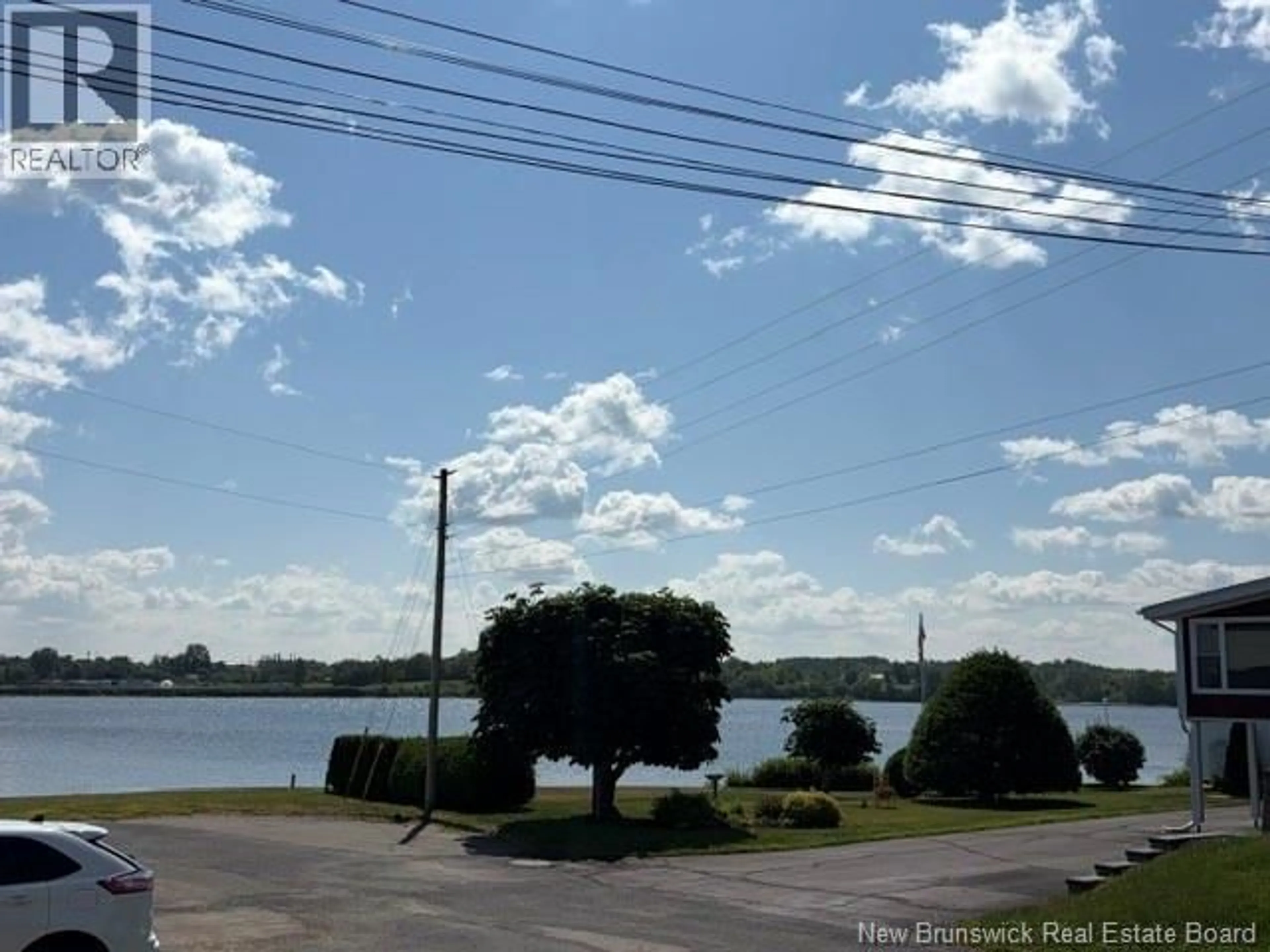 A pic from outside/outdoor area/front of a property/back of a property/a pic from drone, water/lake/river/ocean view for 424 GOLF STREET, Bathurst New Brunswick E2A2K5
