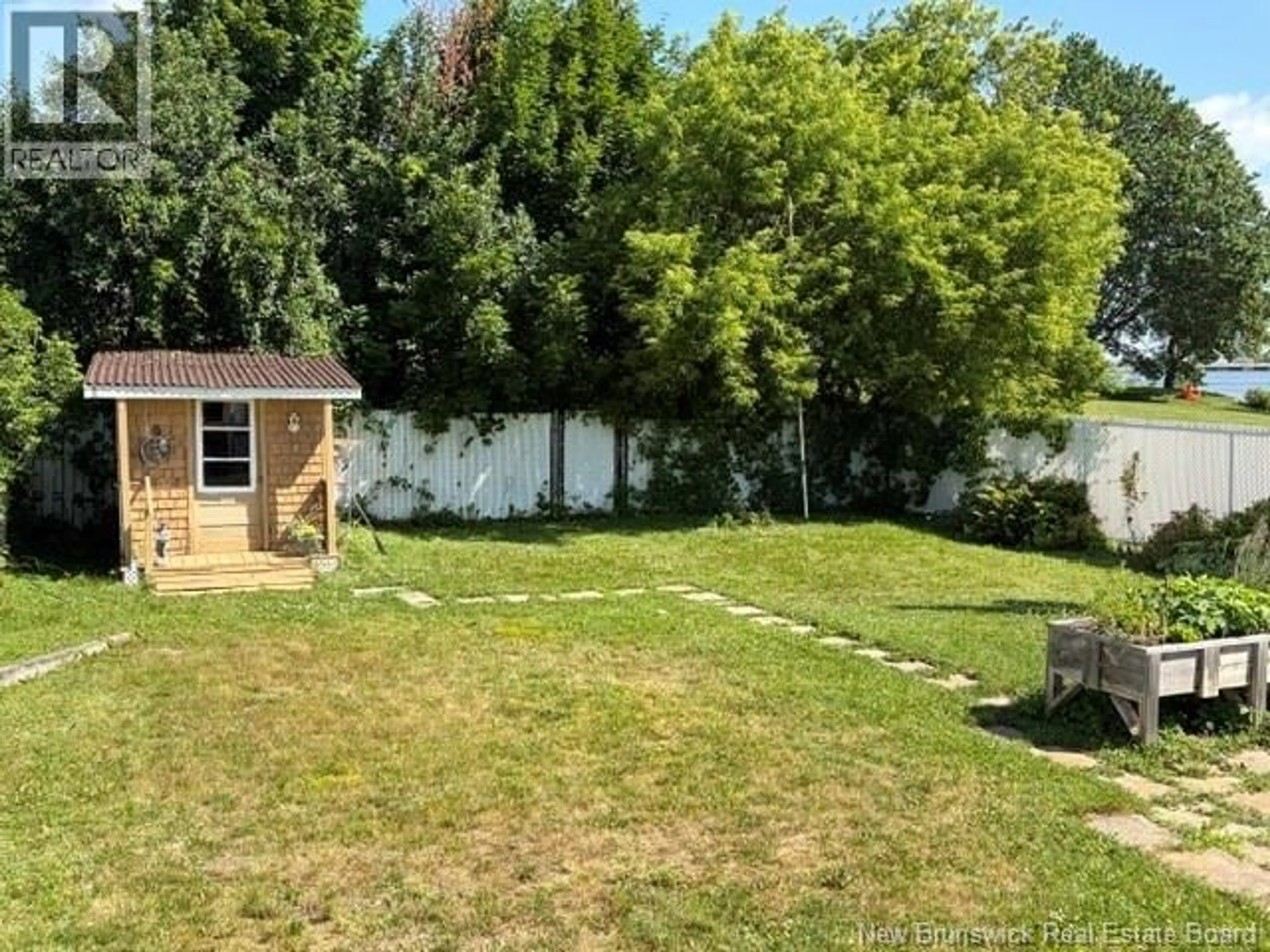 A pic from outside/outdoor area/front of a property/back of a property/a pic from drone, street for 424 GOLF STREET, Bathurst New Brunswick E2A2K5