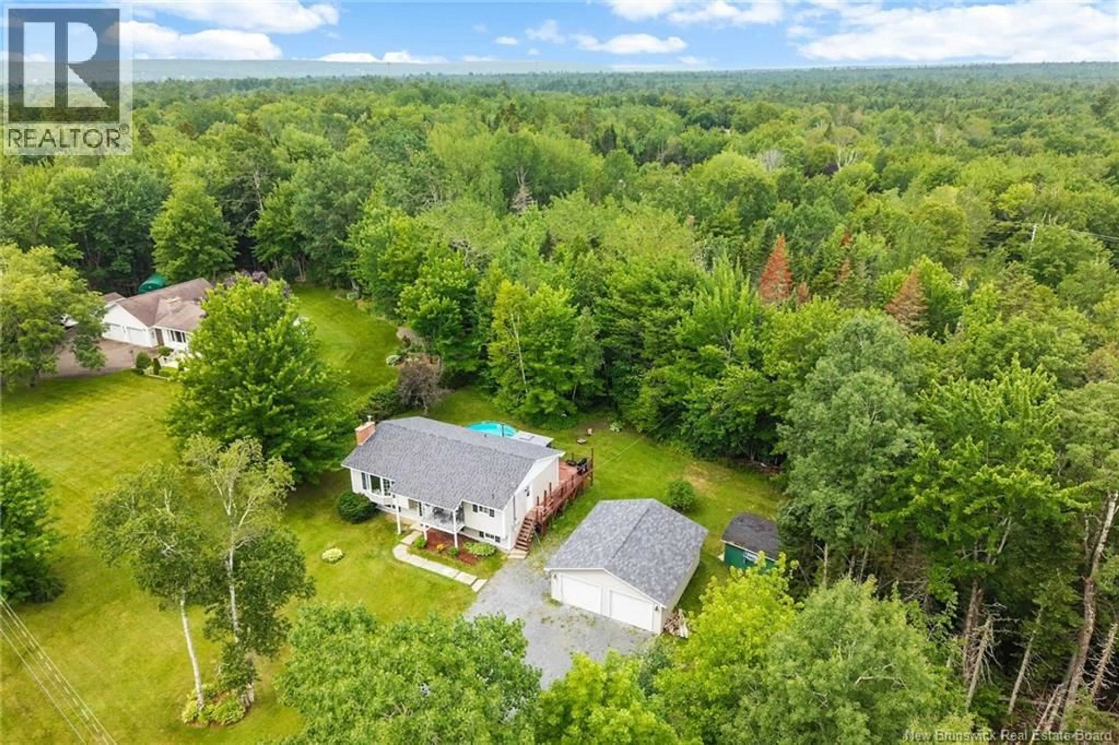 A pic from outside/outdoor area/front of a property/back of a property/a pic from drone, unknown for 15 CAMBER DRIVE, Hanwell New Brunswick E3C2K3