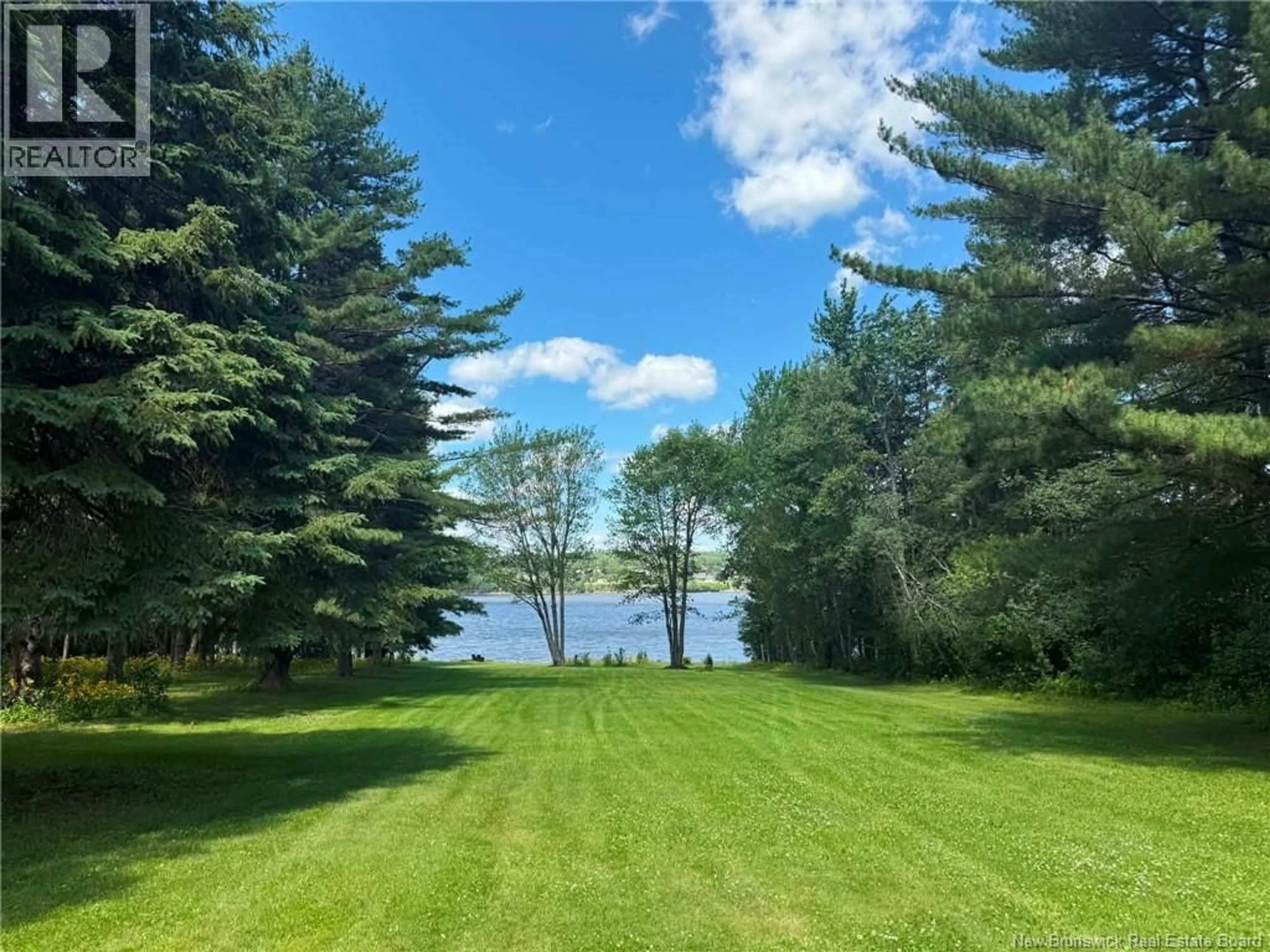 A pic from outside/outdoor area/front of a property/back of a property/a pic from drone, water/lake/river/ocean view for 717 WATER STREET, Miramichi New Brunswick E1N4B9