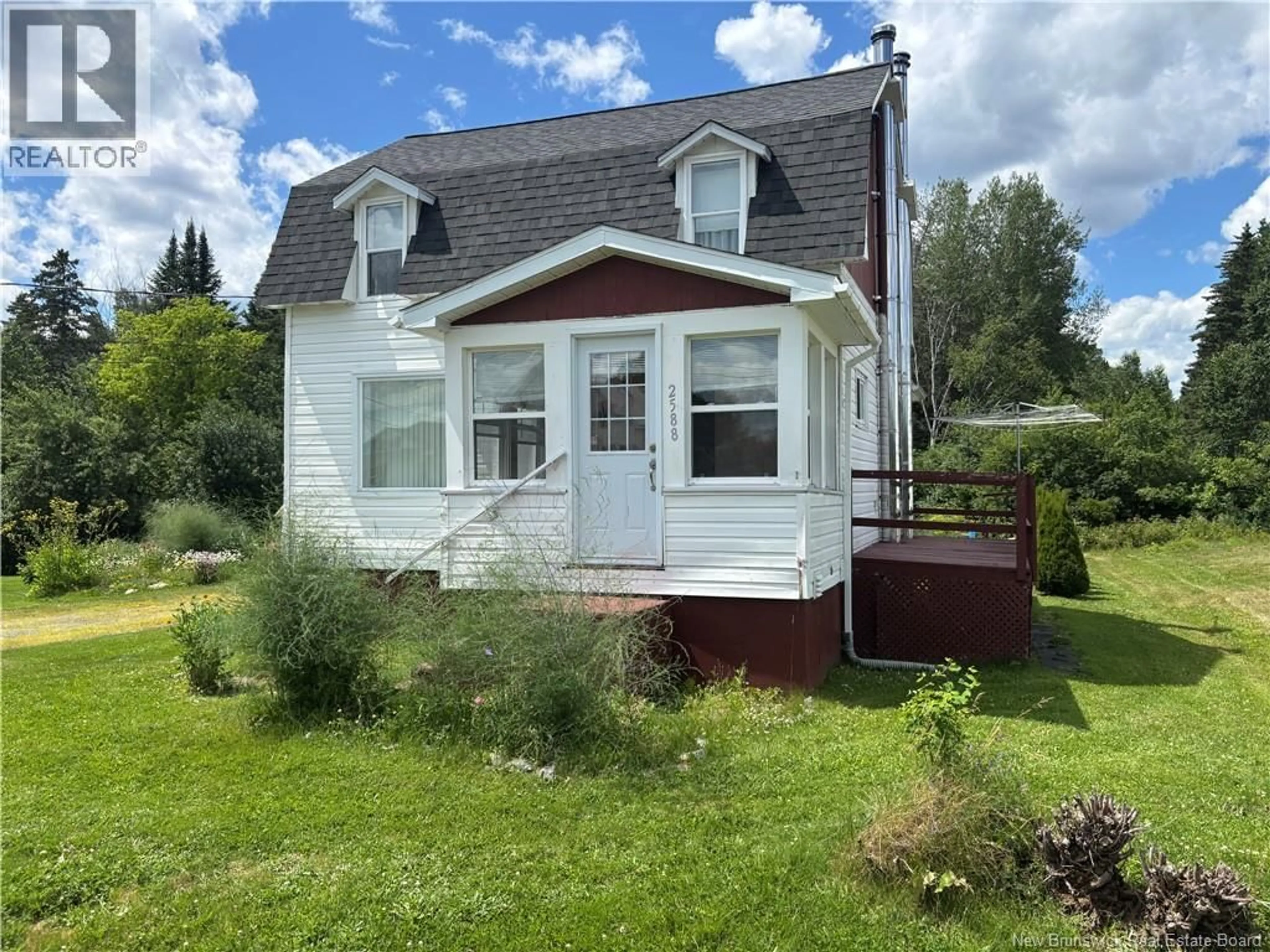 Home with vinyl exterior material, street for 2588 ROUGH WATERS DRIVE, Bathurst New Brunswick E2A4K6