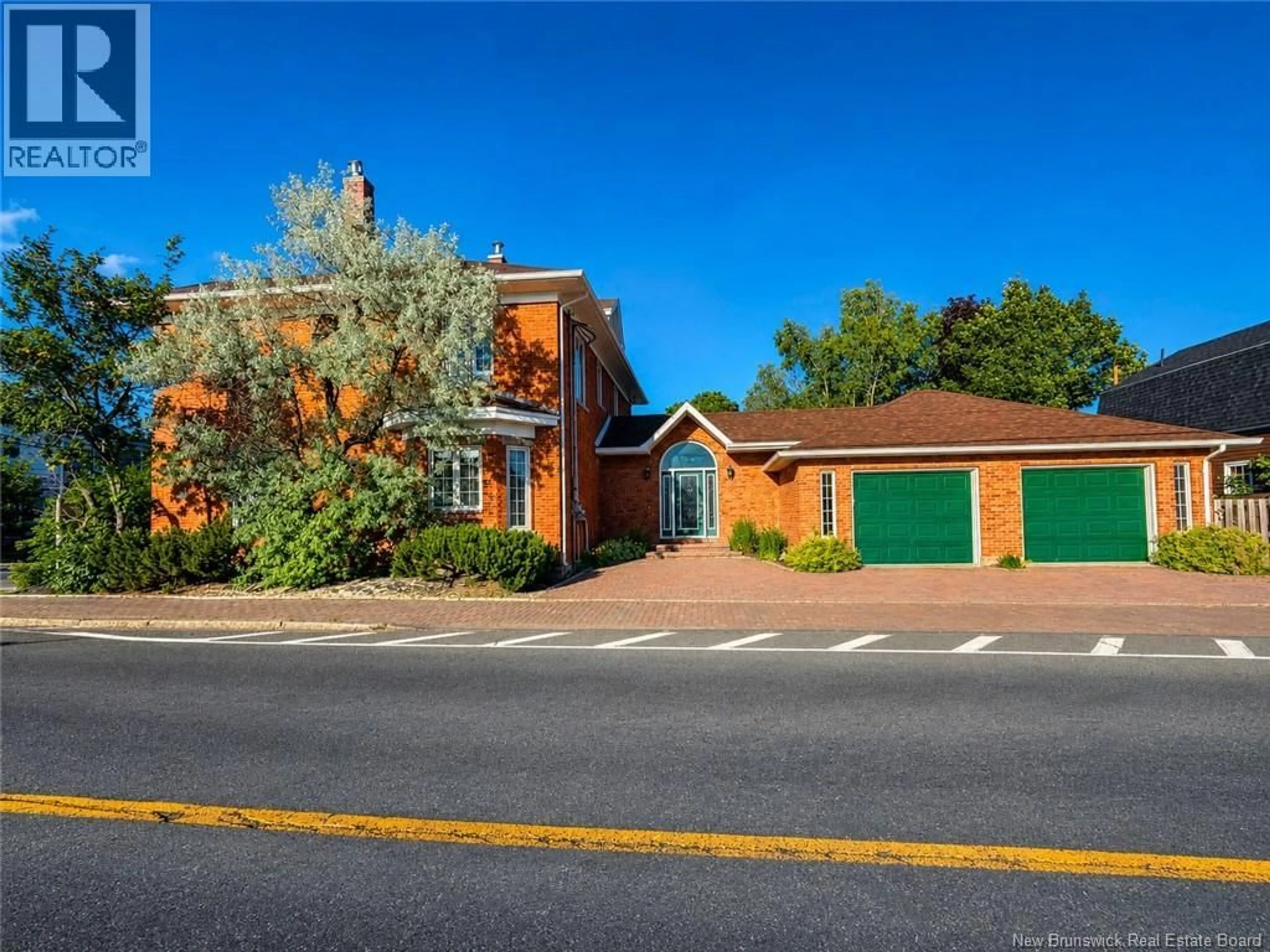 A pic from outside/outdoor area/front of a property/back of a property/a pic from drone, street for 102 ST GEORGE, Bathurst New Brunswick E2A1B5