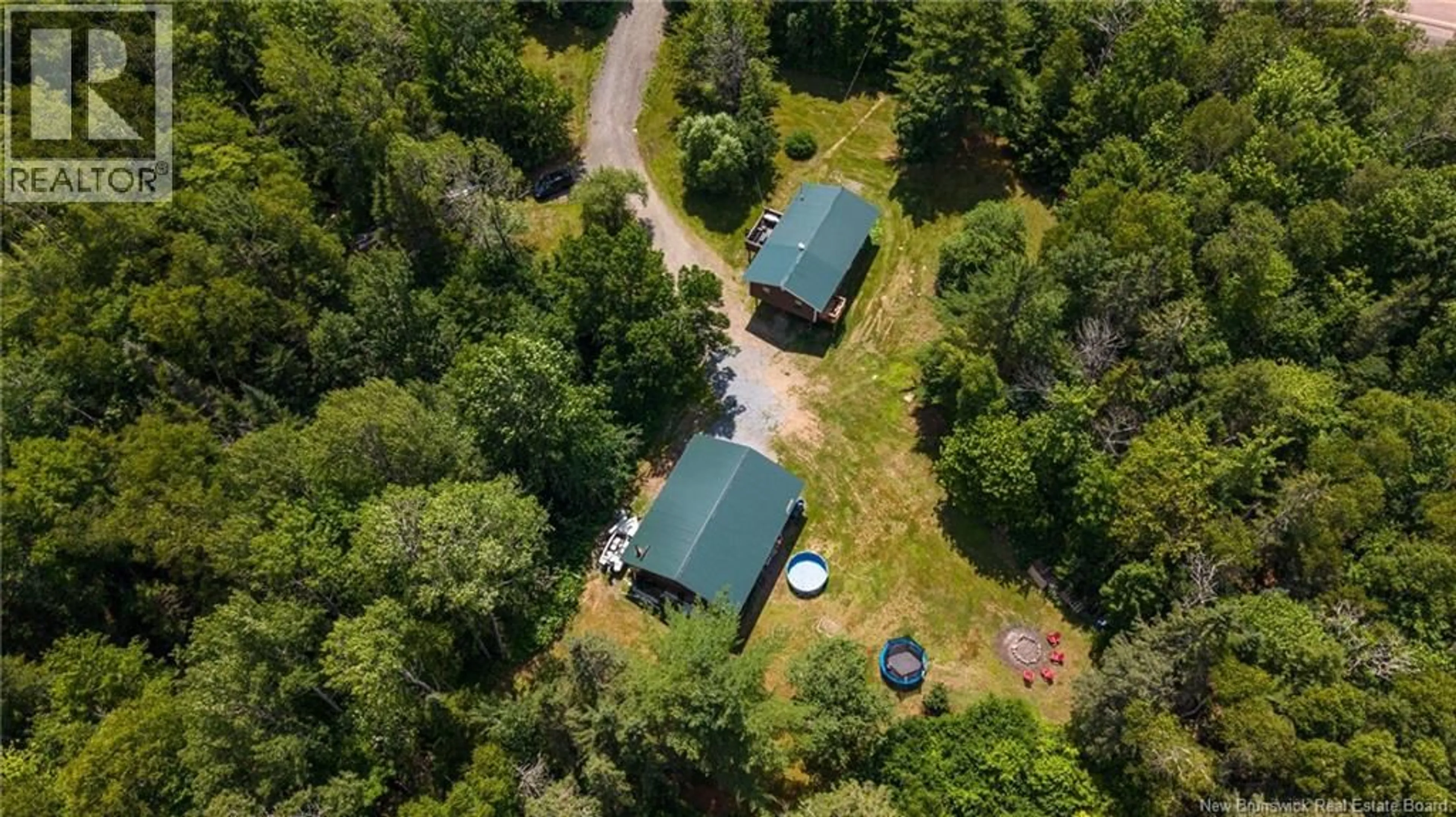 A pic from outside/outdoor area/front of a property/back of a property/a pic from drone, forest/trees view for 44 EAGLE ROCK ROAD, Welsford New Brunswick E5K3X7