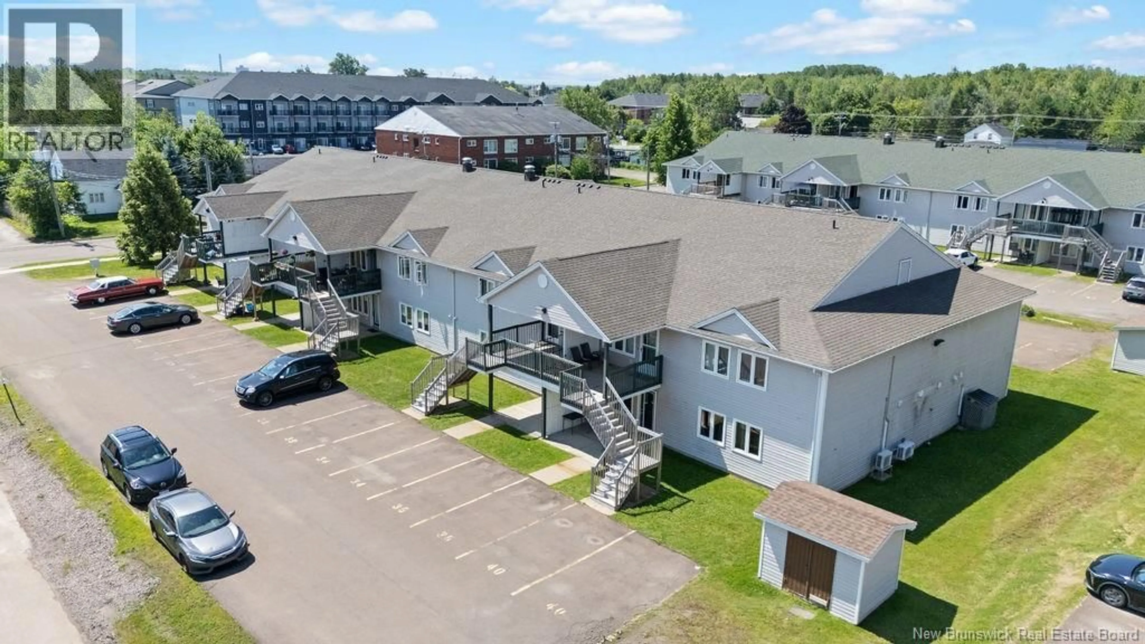 A pic from outside/outdoor area/front of a property/back of a property/a pic from drone, building for 35 - 30 GRANT STREET, Moncton New Brunswick E1A3R4