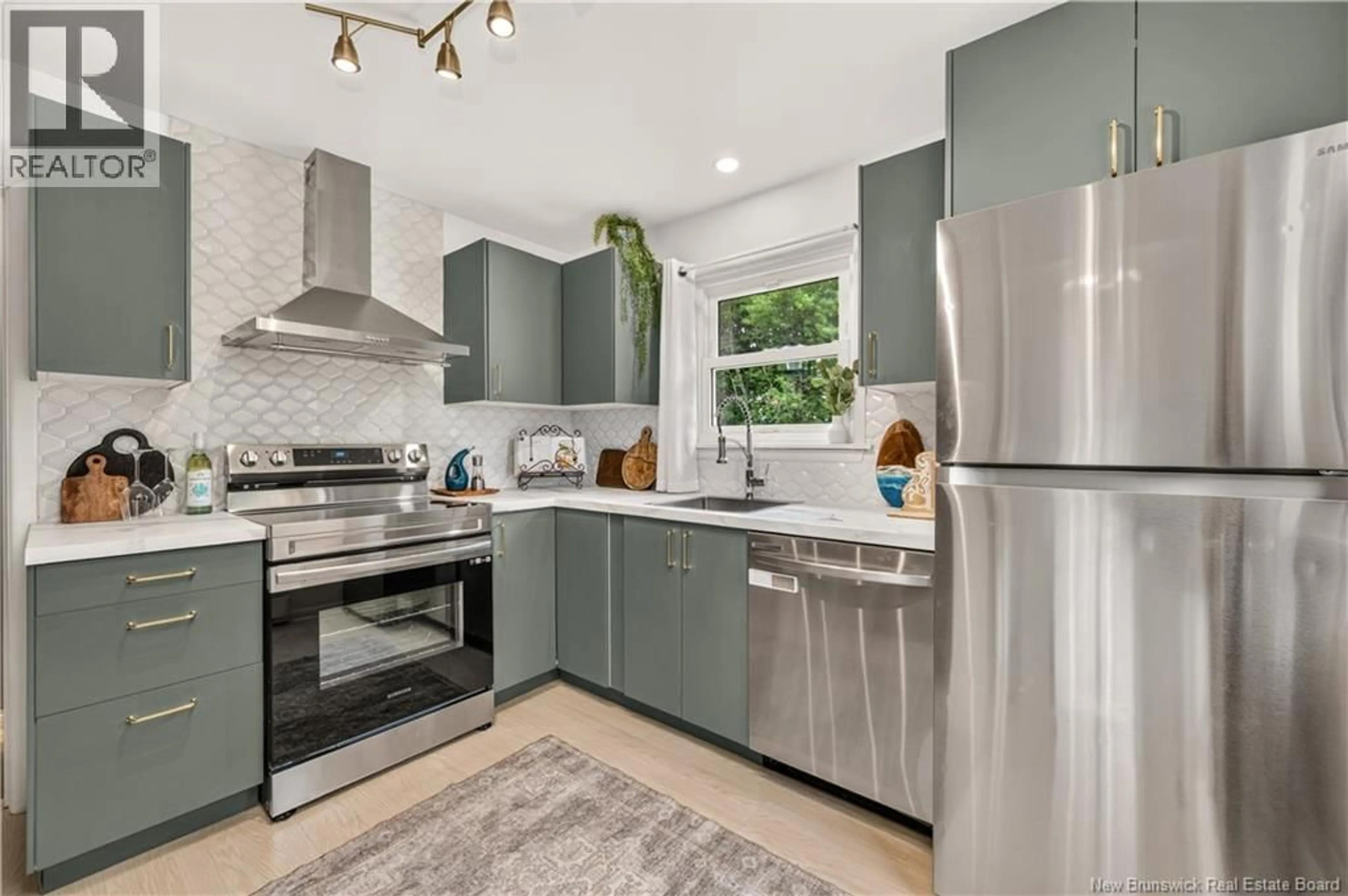 Open concept kitchen, ceramic/tile floor for 101 SOMERSET DRIVE, Moncton New Brunswick E1A3T8