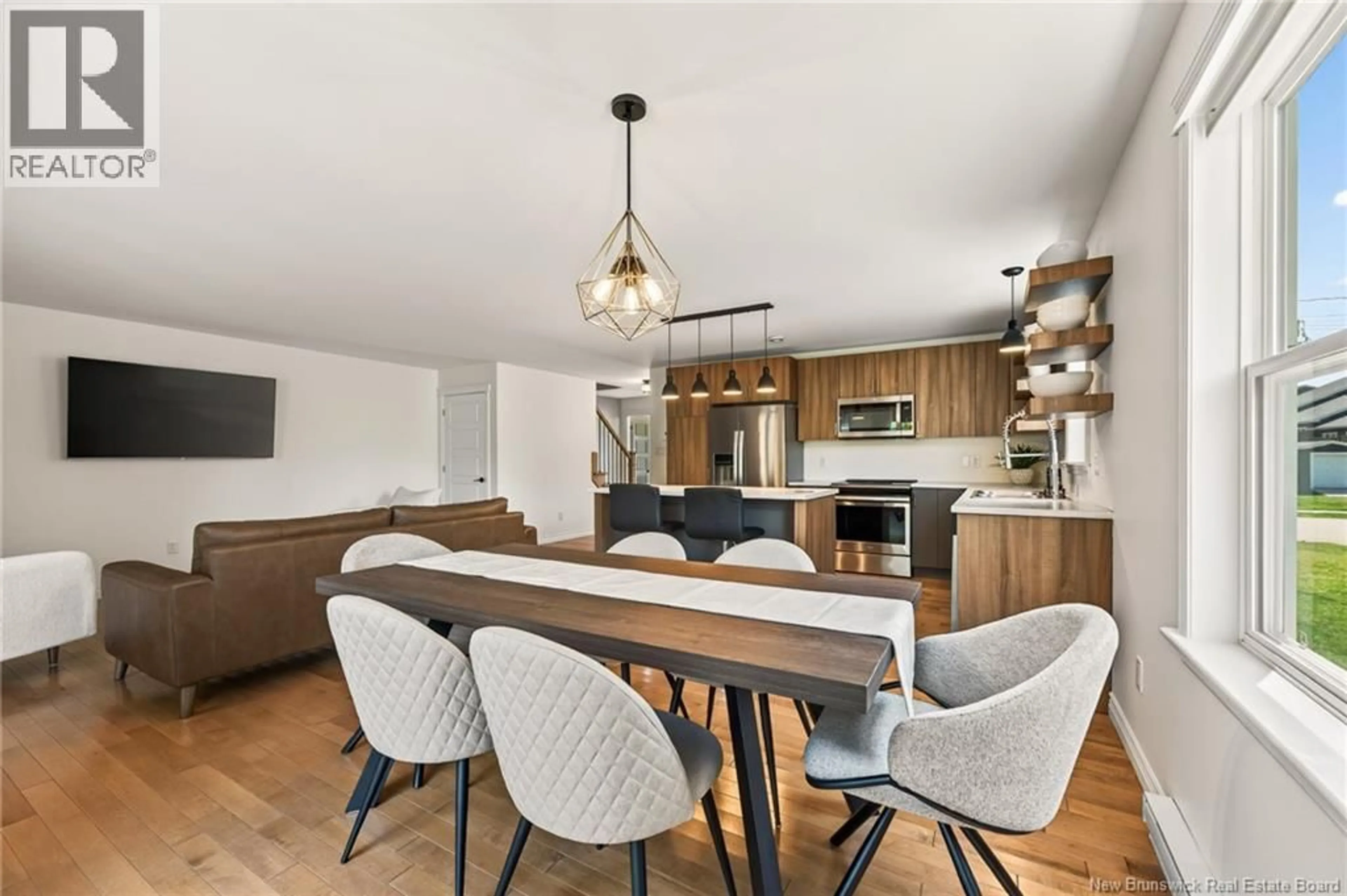 Open concept kitchen, wood/laminate floor for 259 DOLBEAU STREET, Dieppe New Brunswick E1A9P9