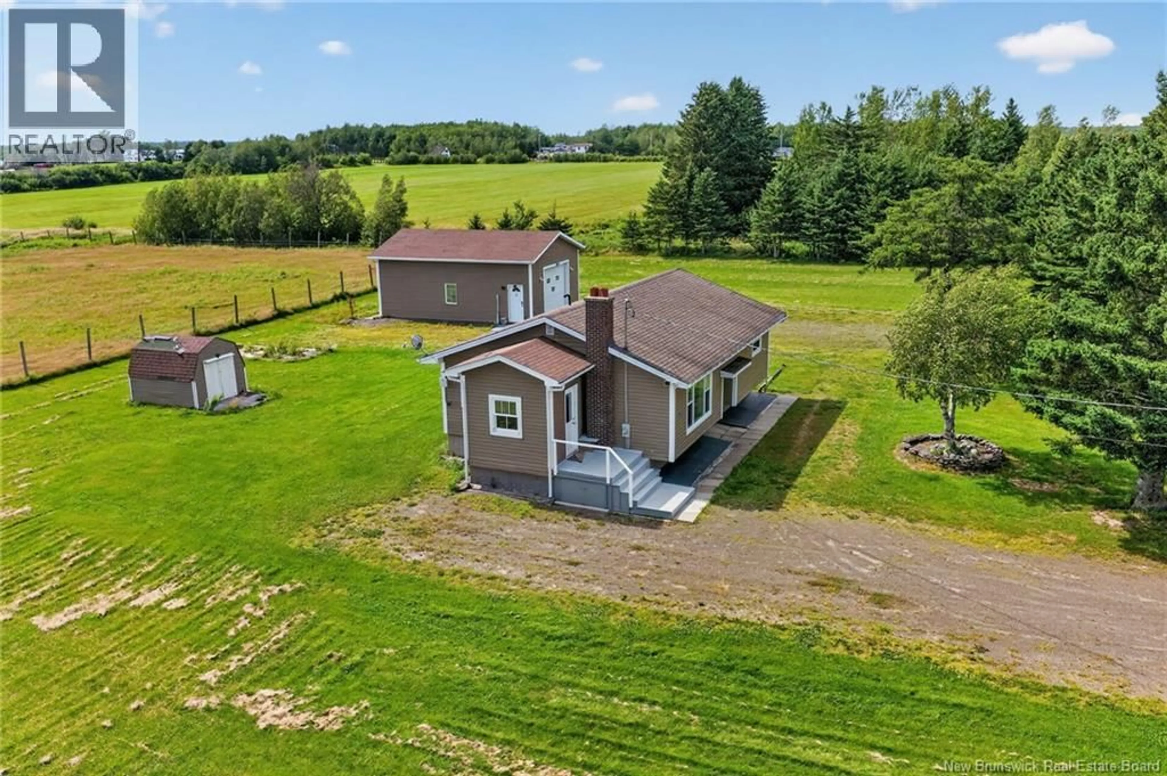A pic from outside/outdoor area/front of a property/back of a property/a pic from drone, building for 209 CHEMIN DES DALLAIRE, Sainte-Marie-De-Kent New Brunswick E4S1S2