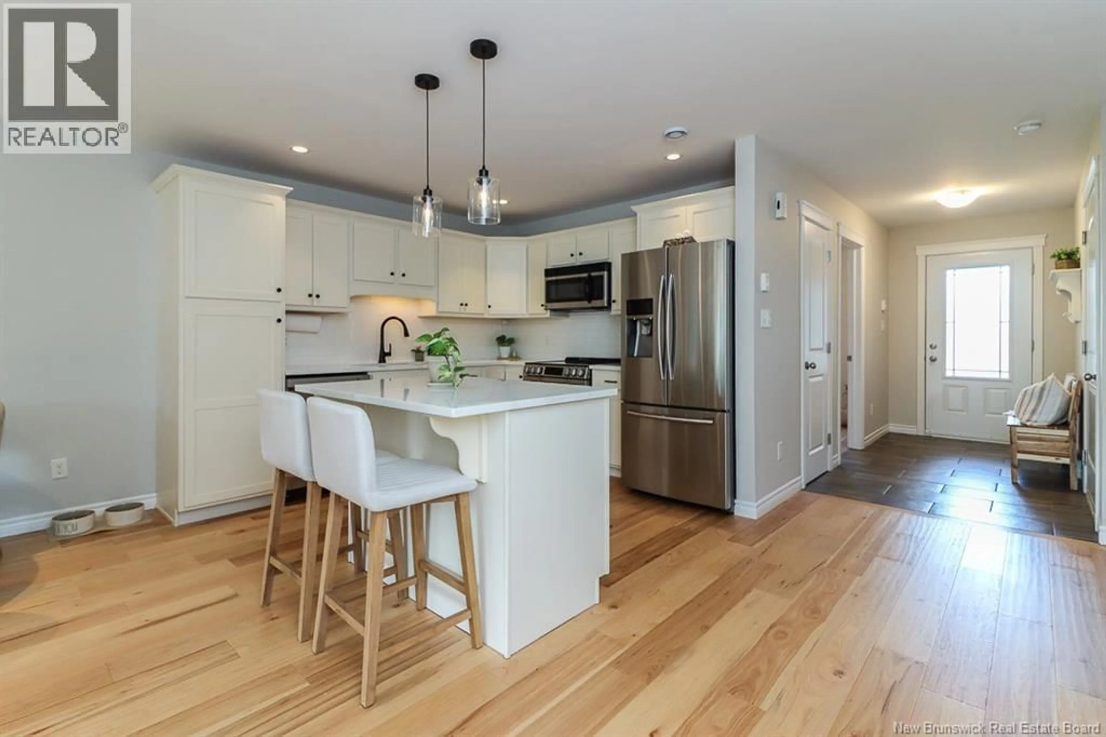 Open concept kitchen, wood/laminate floor for 14 KAITLYN STREET, Rothesay New Brunswick E2E0M6
