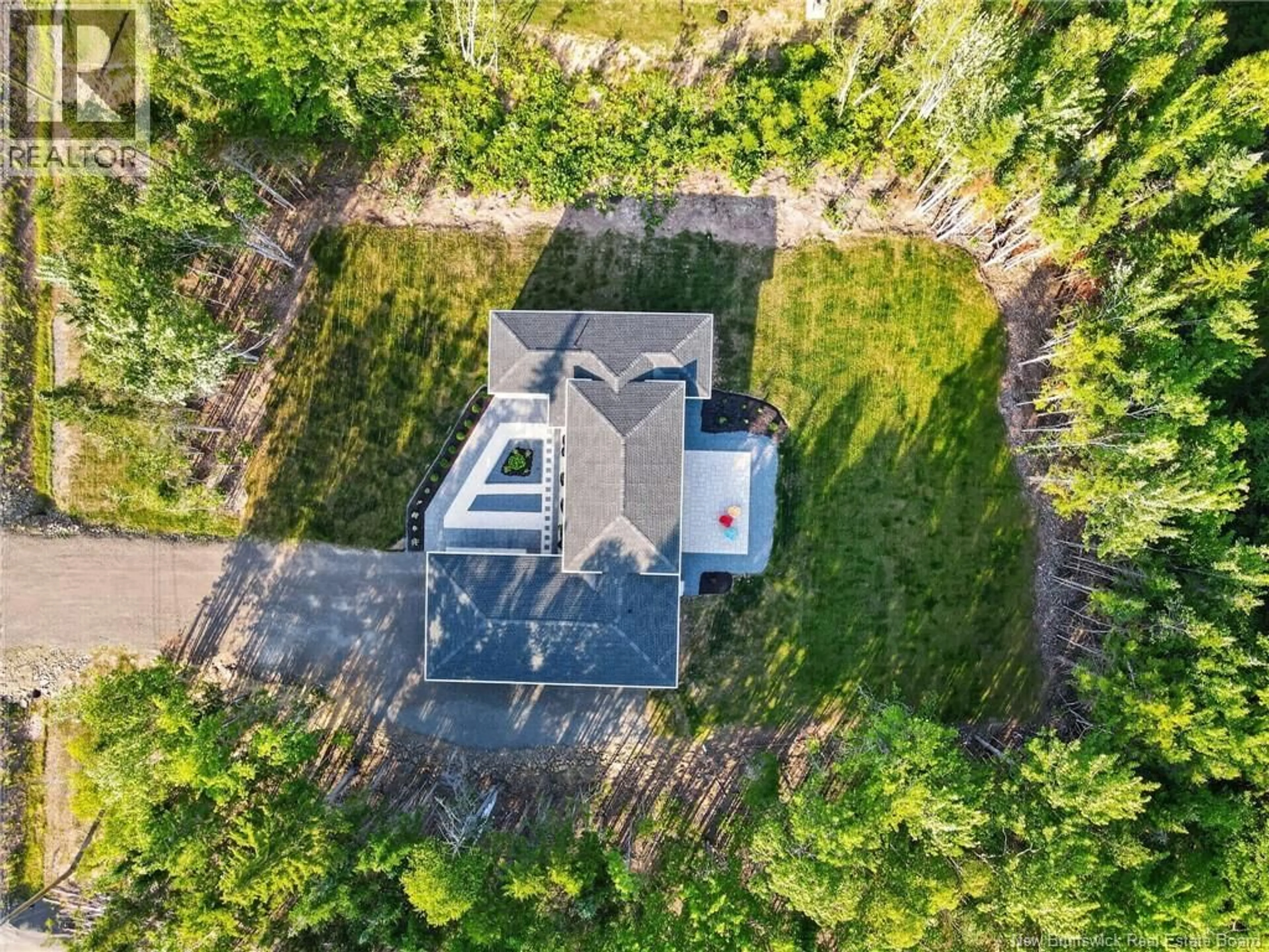 A pic from outside/outdoor area/front of a property/back of a property/a pic from drone, unknown for 95 VIA ROMA WAY, Irishtown New Brunswick E1H0H9
