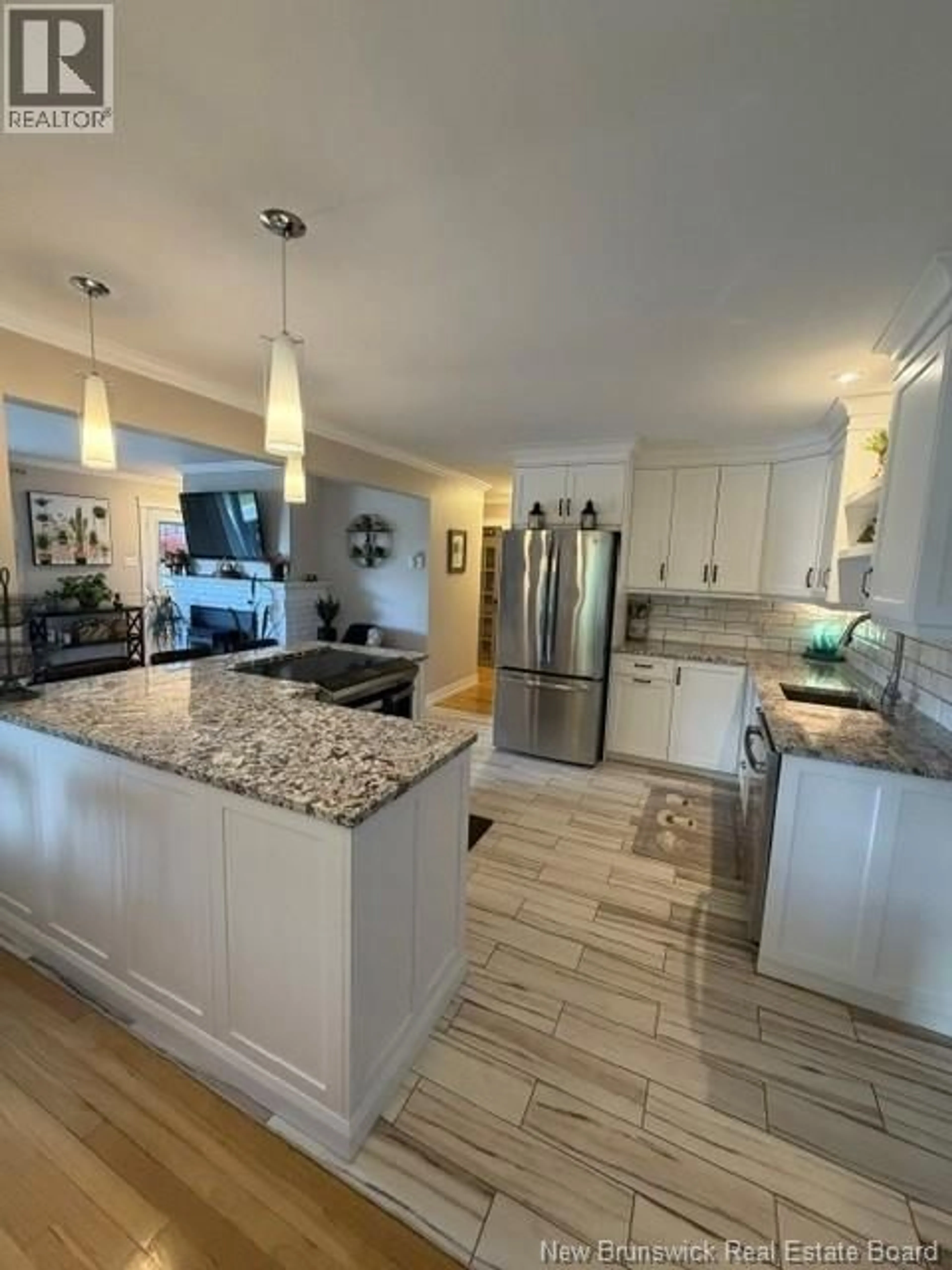 Open concept kitchen, ceramic/tile floor for 1029 DEVER ROAD, Saint John New Brunswick E2M4J6