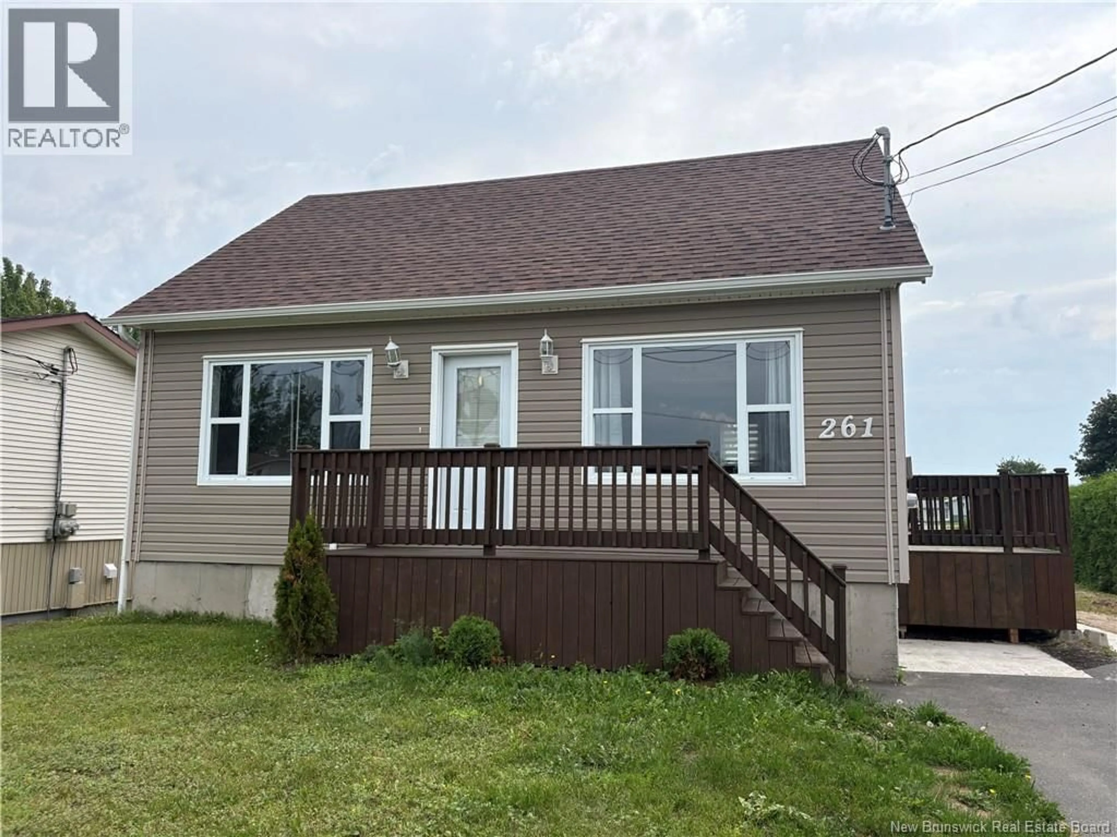 Home with vinyl exterior material, building for 261 MARIE STREET, Beresford New Brunswick E8K1P9