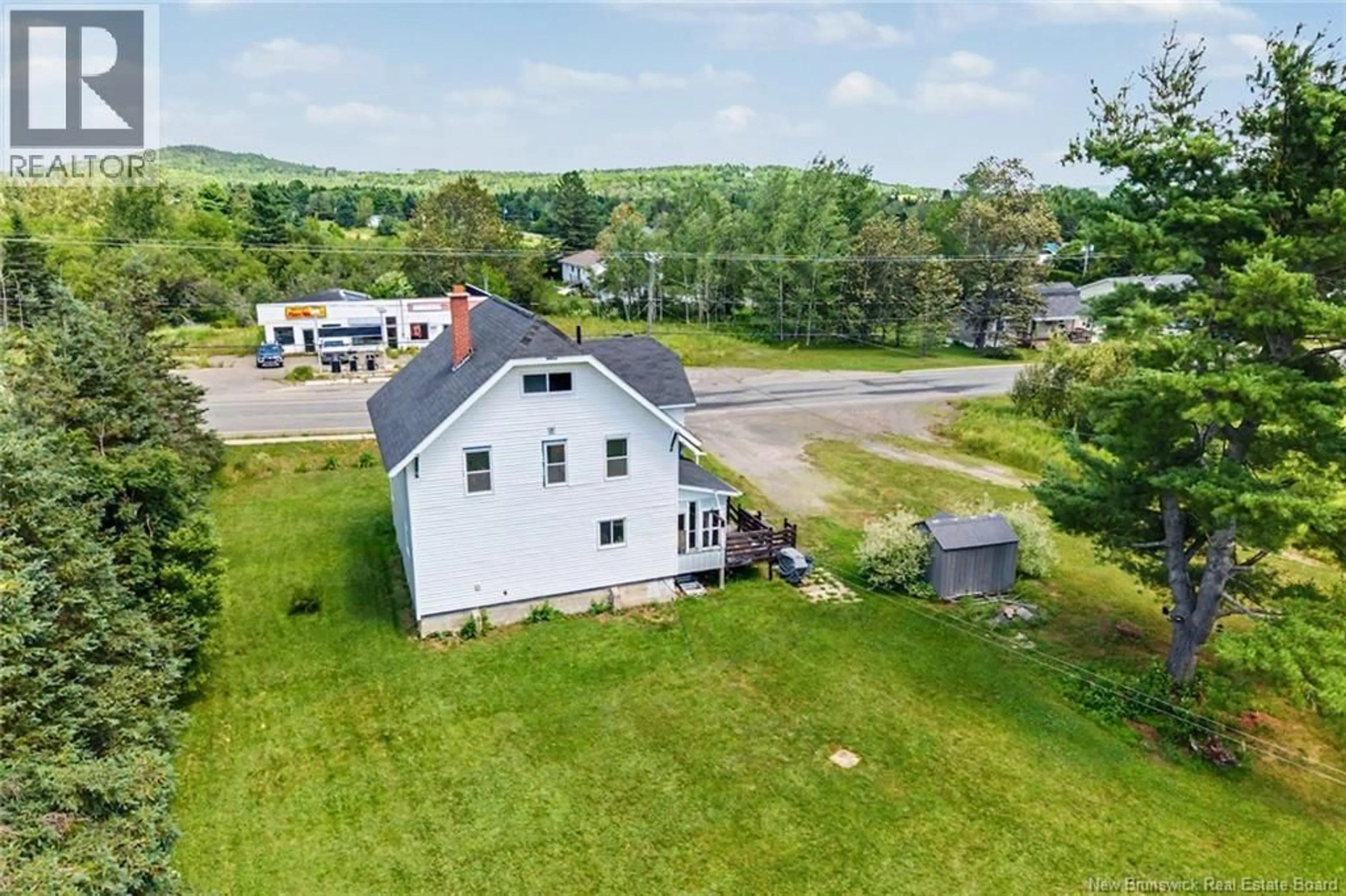 A pic from outside/outdoor area/front of a property/back of a property/a pic from drone, building for 3945 ROUTE 104, Millville New Brunswick E6E1S6