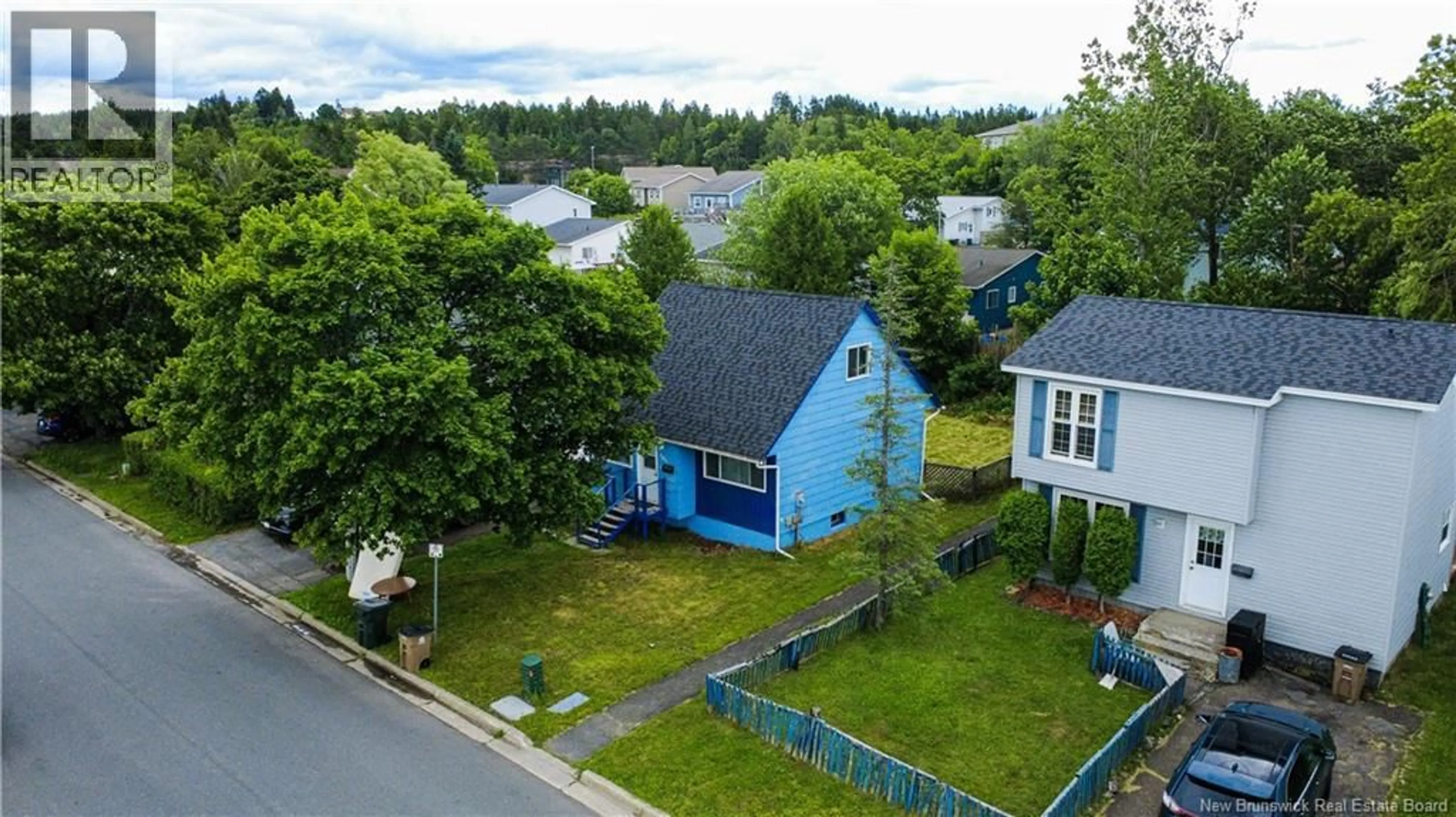 A pic from outside/outdoor area/front of a property/back of a property/a pic from drone, street for 103 BOYANER CRESCENT, Saint John New Brunswick E2J4C8