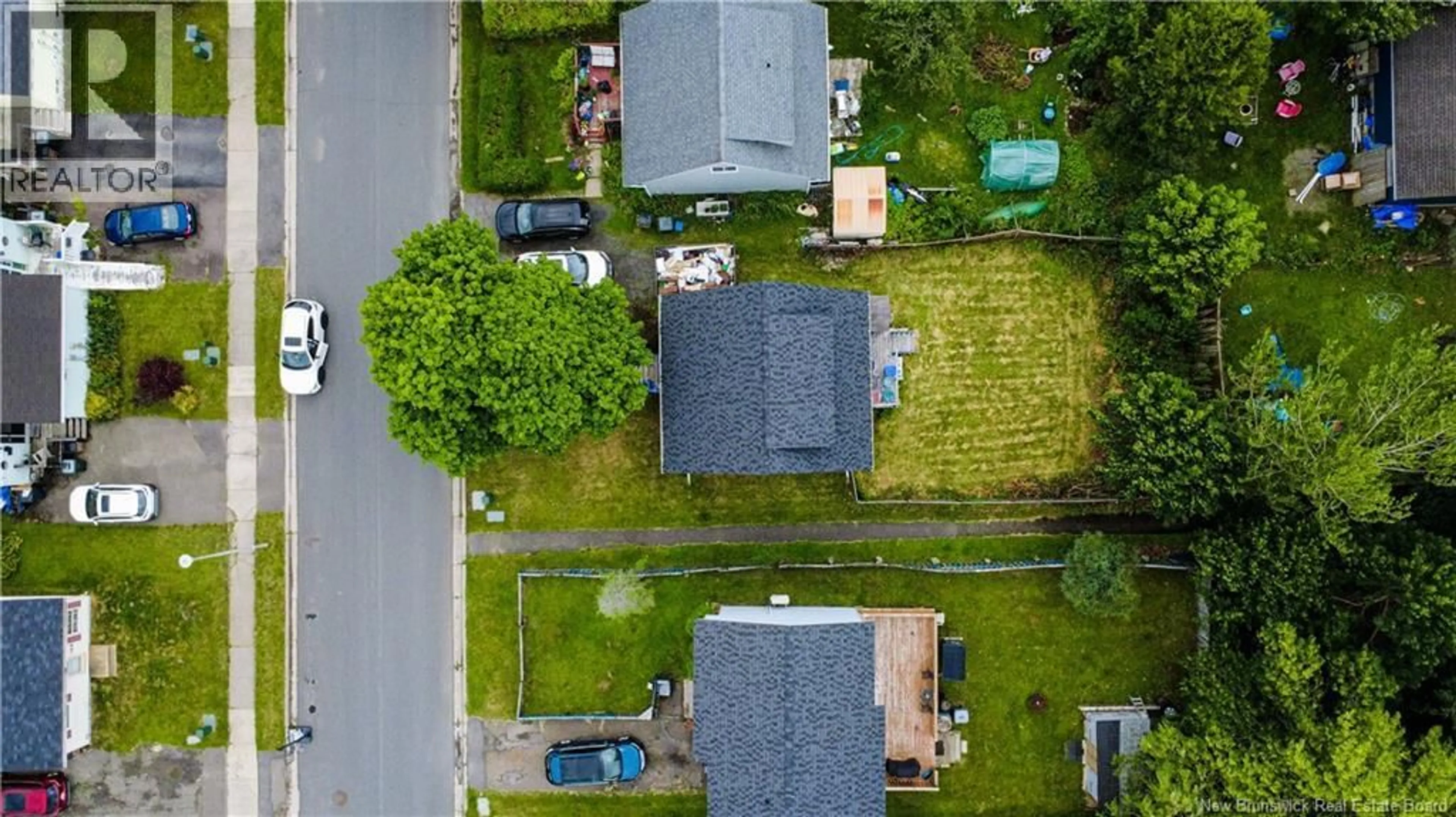 A pic from outside/outdoor area/front of a property/back of a property/a pic from drone, street for 103 BOYANER CRESCENT, Saint John New Brunswick E2J4C8