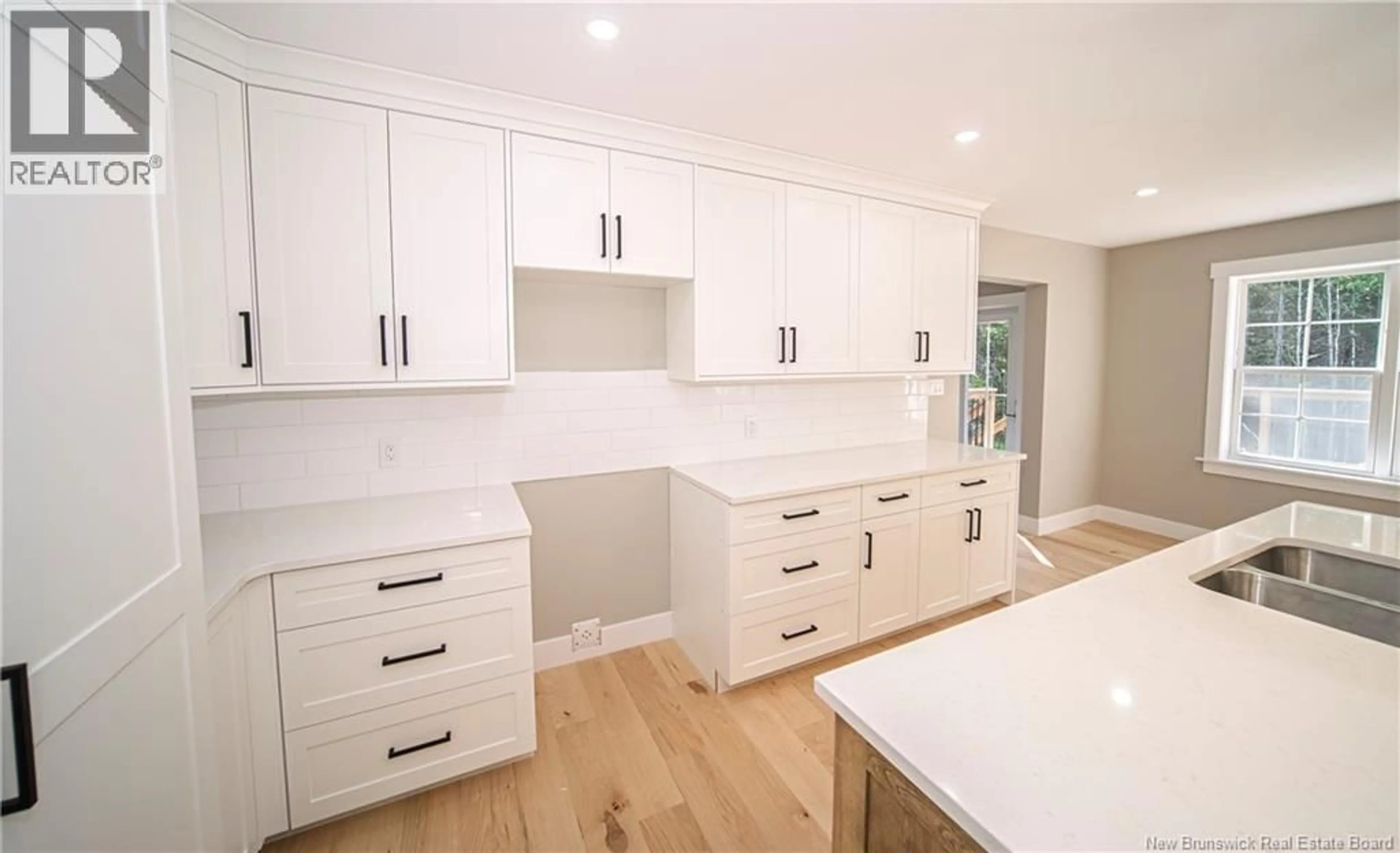 Contemporary kitchen, wood/laminate floor for 39 LAURA LANE, Charters Settlement New Brunswick E3C0R4