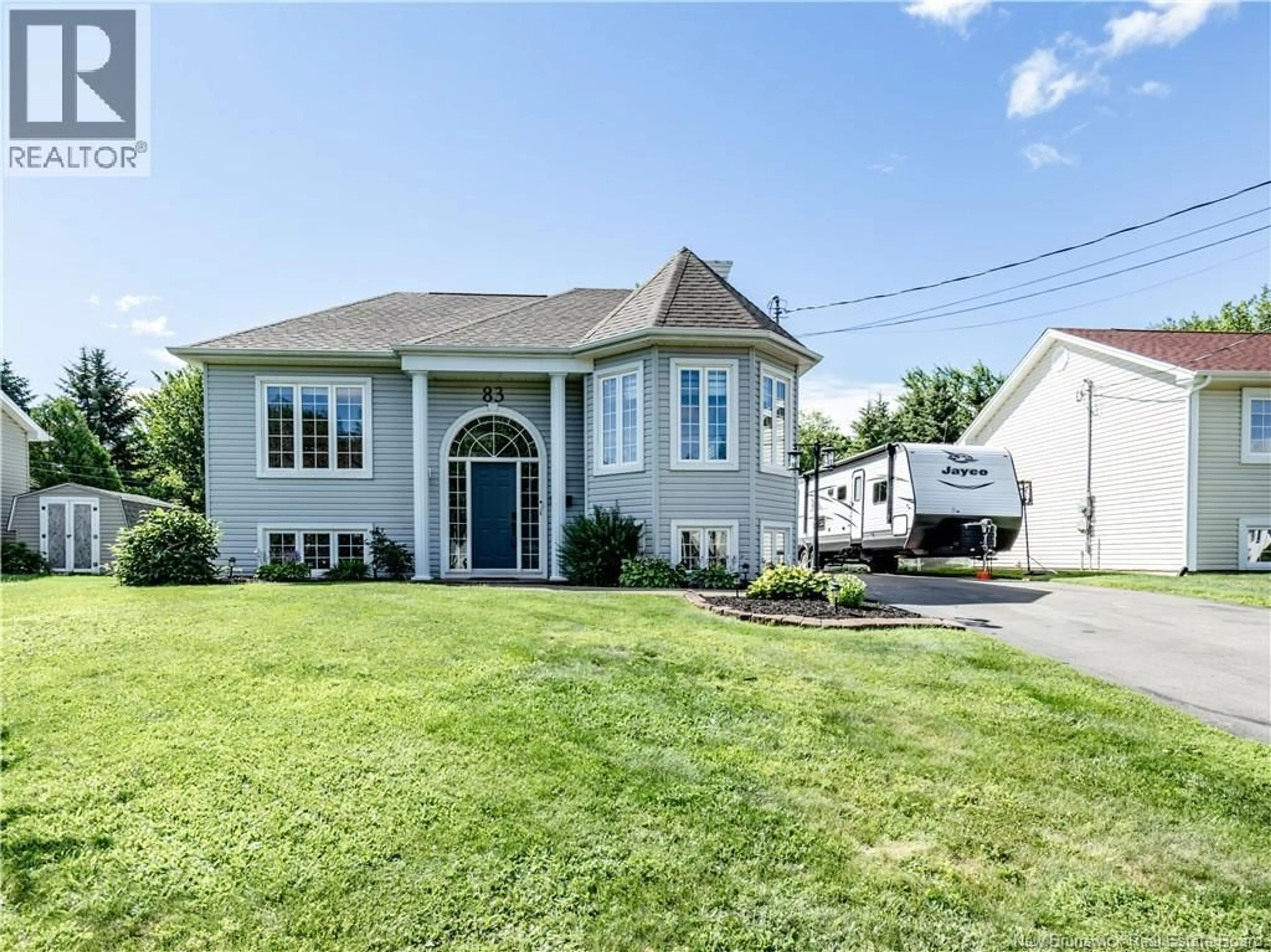 Home with vinyl exterior material, street for 83 FREDERIC, Dieppe New Brunswick E1A7N9