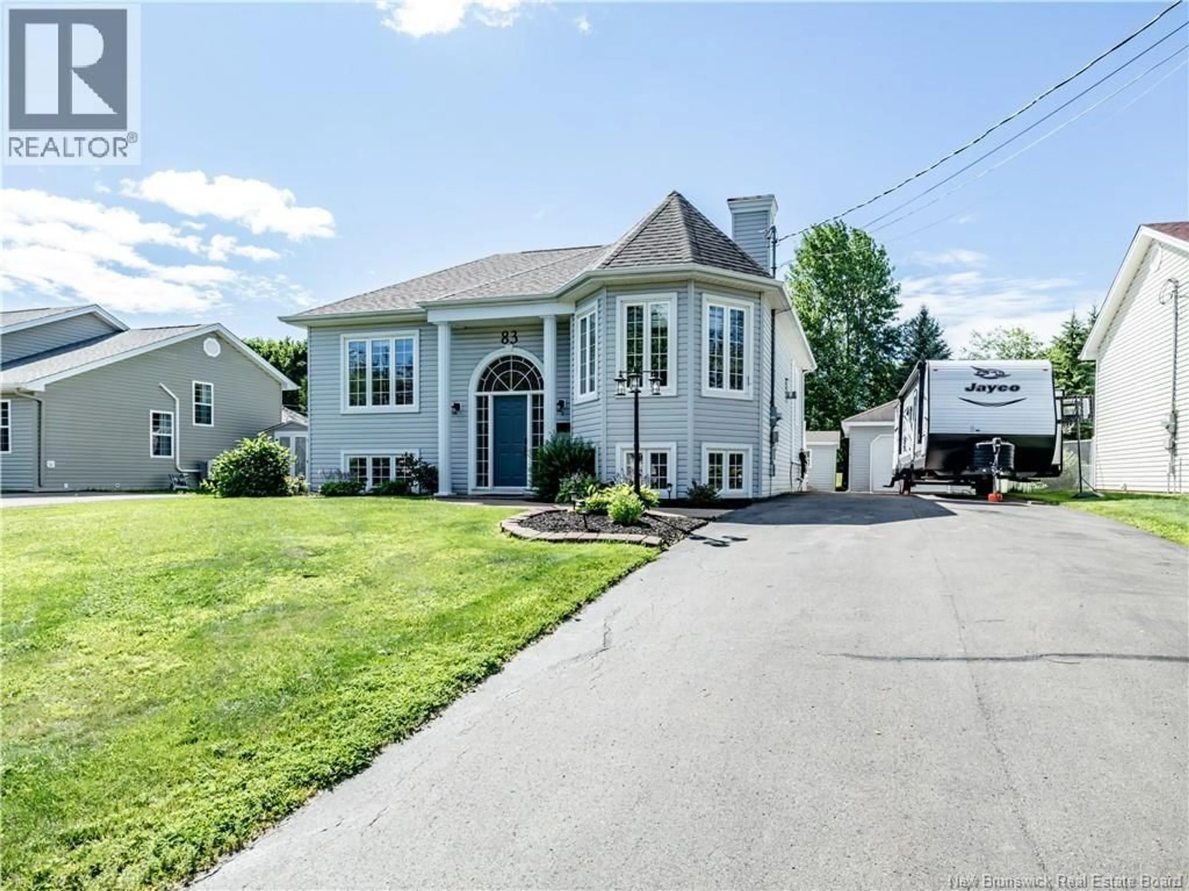 Home with vinyl exterior material, street for 83 FREDERIC, Dieppe New Brunswick E1A7N9