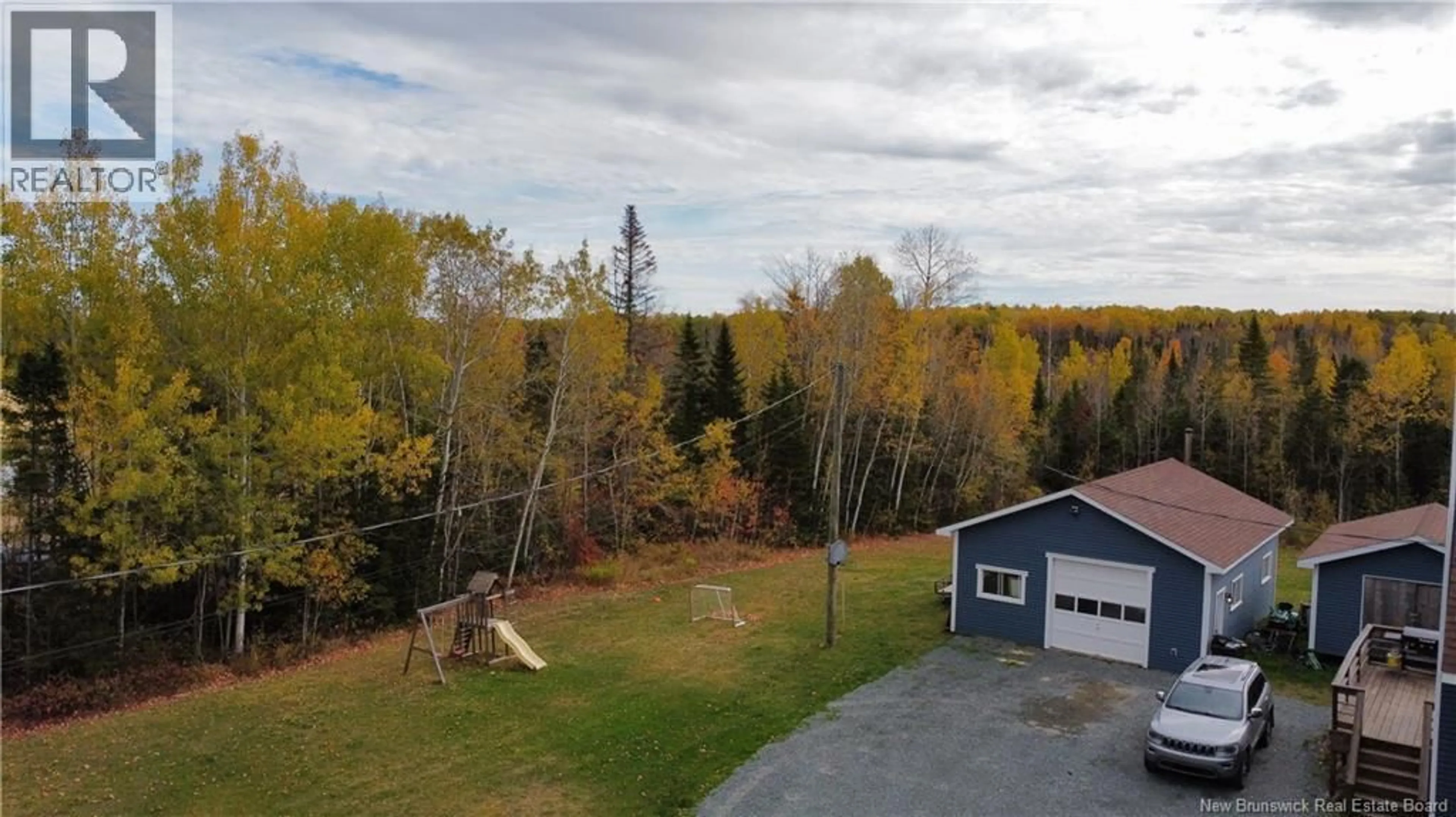 A pic from outside/outdoor area/front of a property/back of a property/a pic from drone, forest/trees view for 2381 SORMANY STREET, Sormany New Brunswick E8K3A9