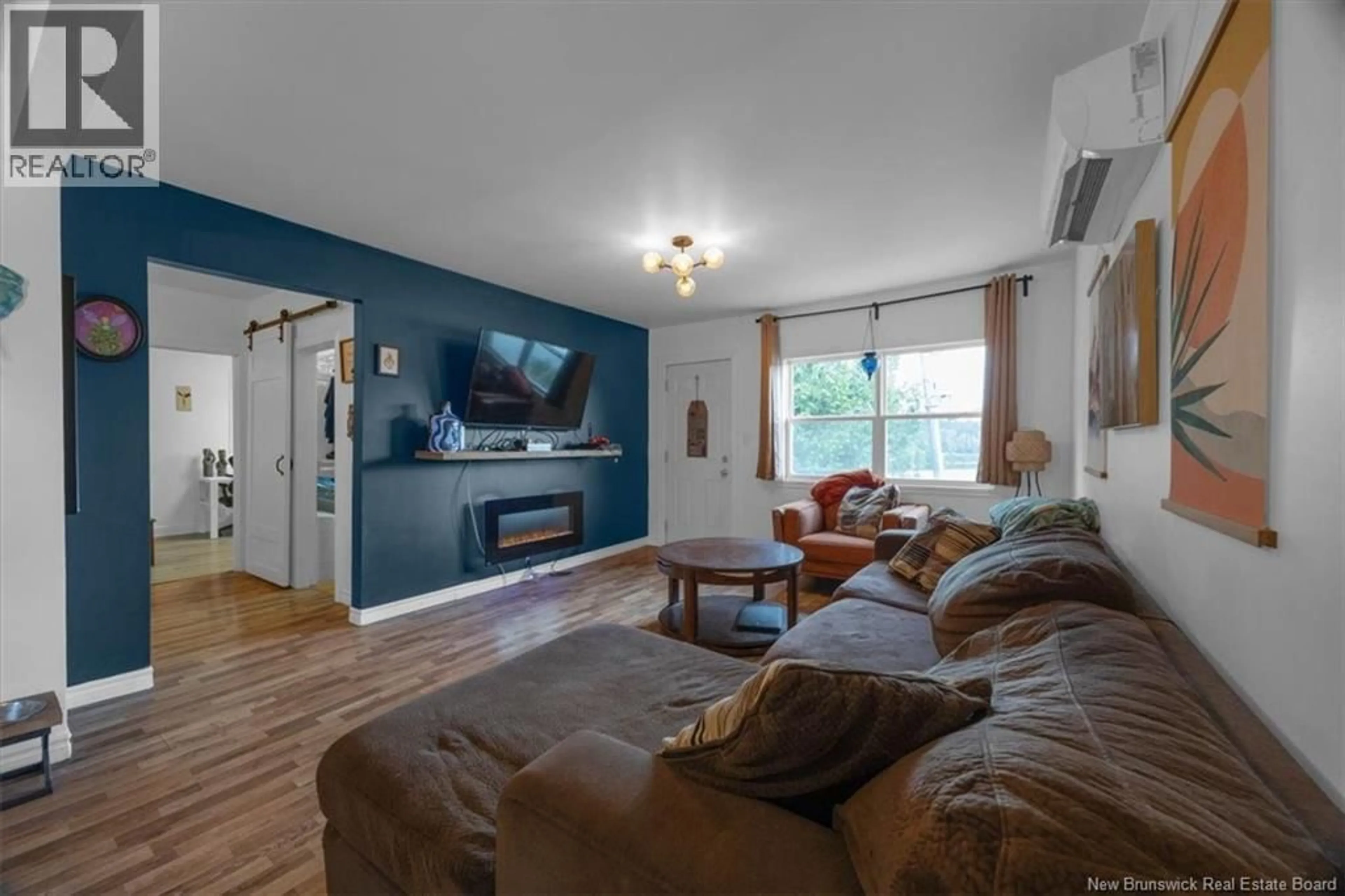 Living room with furniture, wood/laminate floor for 1885 GOLDEN GROVE ROAD, Saint John New Brunswick E2N2A2