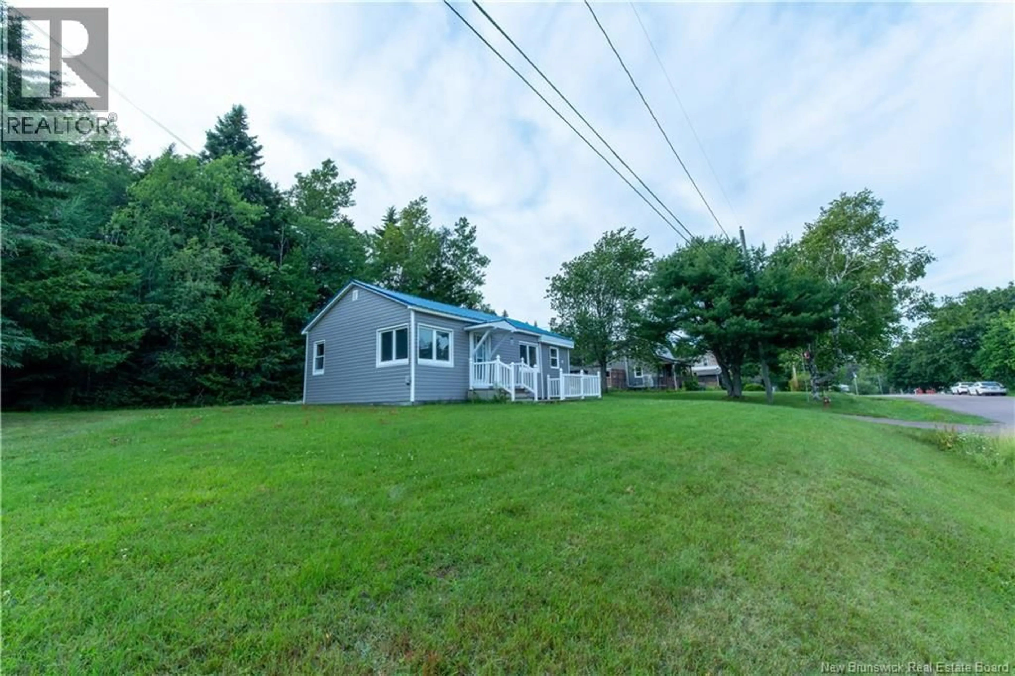 A pic from outside/outdoor area/front of a property/back of a property/a pic from drone, water/lake/river/ocean view for 23 WATER STREET, Dorchester New Brunswick E4K3A2