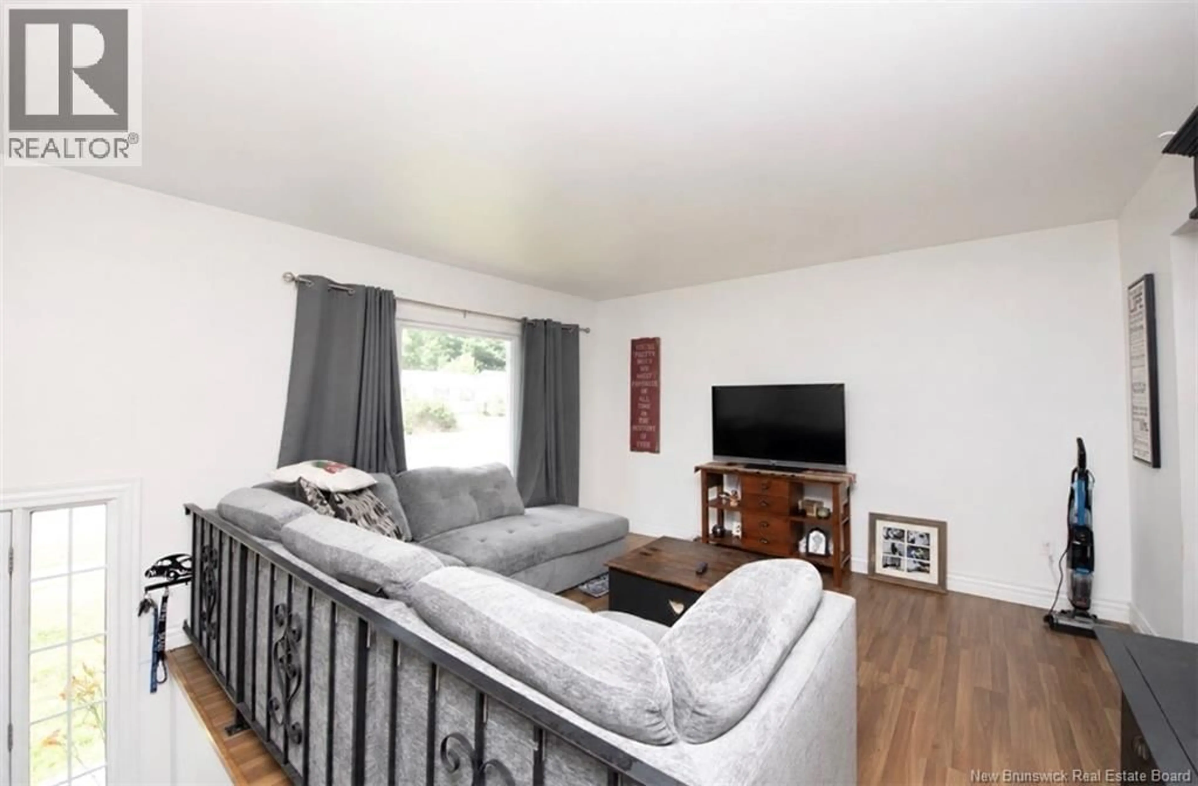 Living room with furniture, wood/laminate floor for 64 PASADENA DRIVE, Moncton New Brunswick E1G1H5