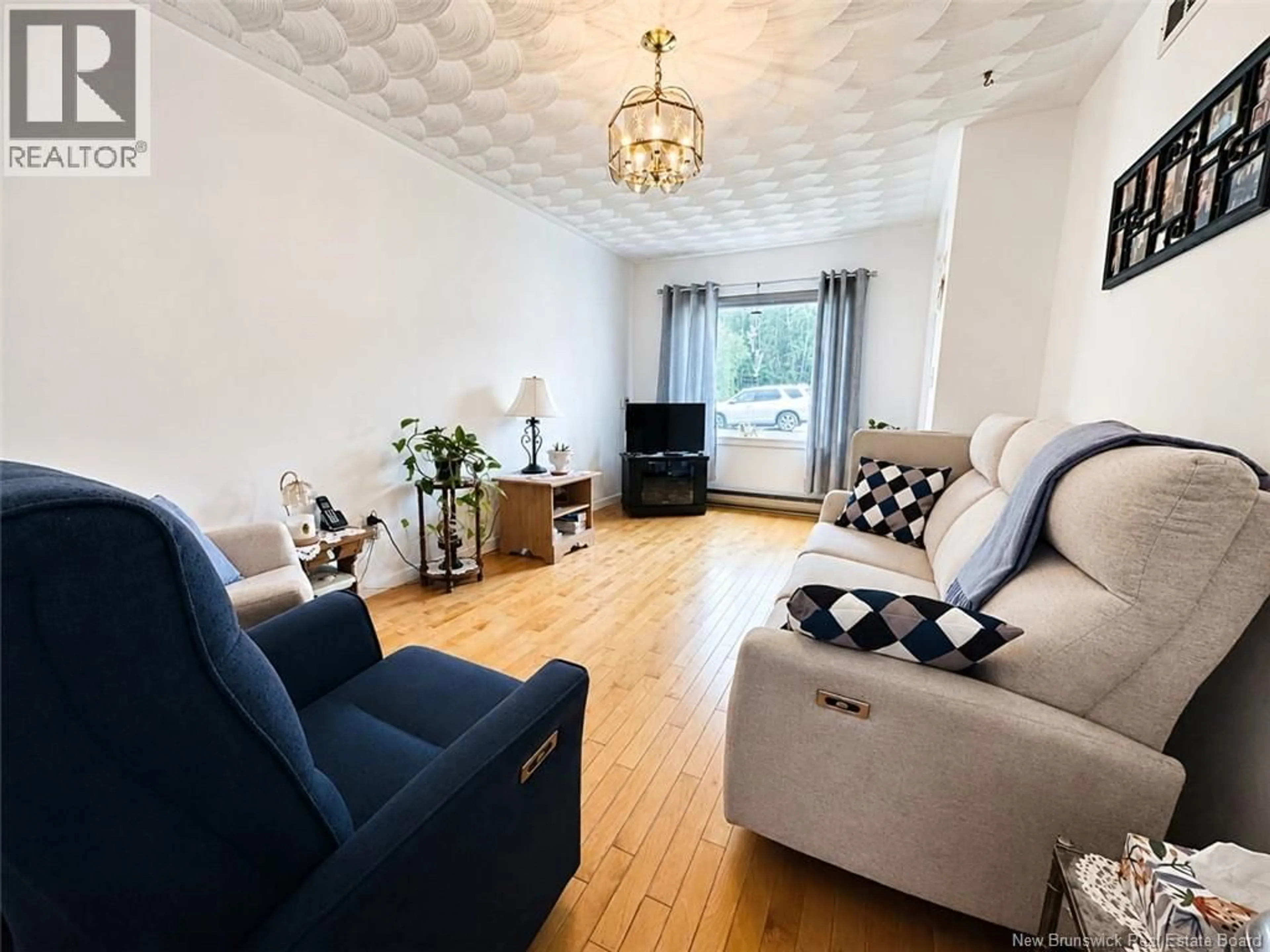 Living room with furniture, unknown for 523 QUEEN STREET, Dalhousie New Brunswick E8C2G7