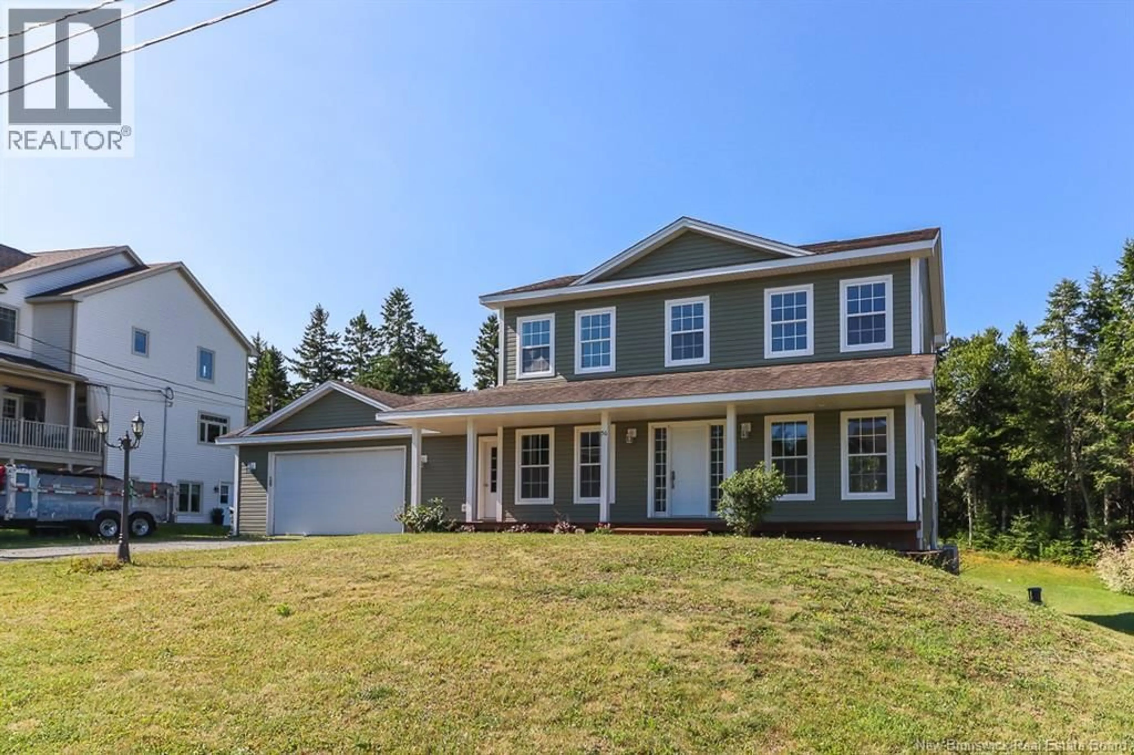Home with vinyl exterior material, street for 56 HEARTHSTONE DRIVE, Quispamsis New Brunswick E2G0C5