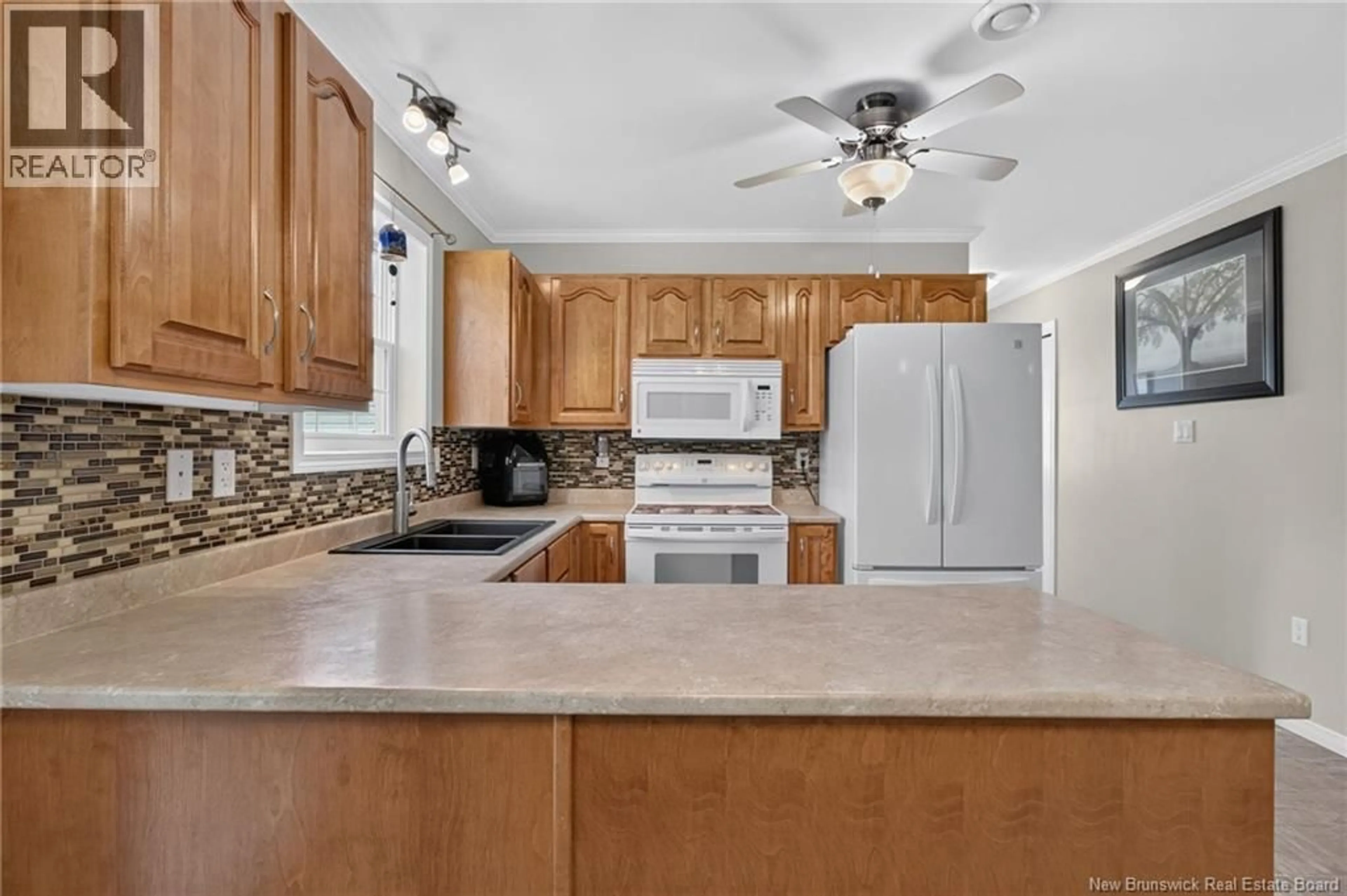 Open concept kitchen, ceramic/tile floor for 23 HEMMINGWAY LANE, Riverview New Brunswick E1B0C5
