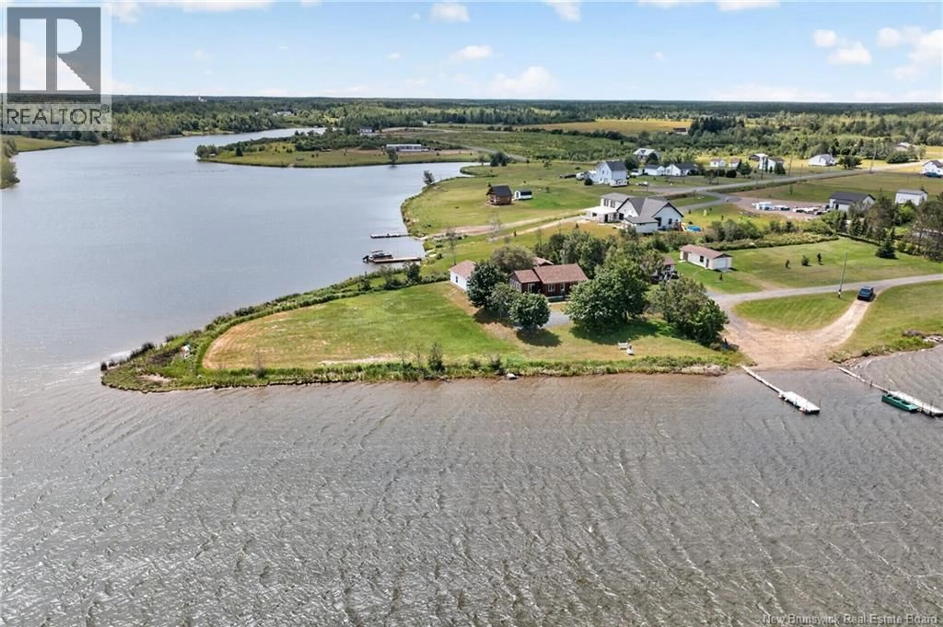 A pic from outside/outdoor area/front of a property/back of a property/a pic from drone, water/lake/river/ocean view for 112 RUE MONICA, Pont-Lafrance New Brunswick E1X4N5