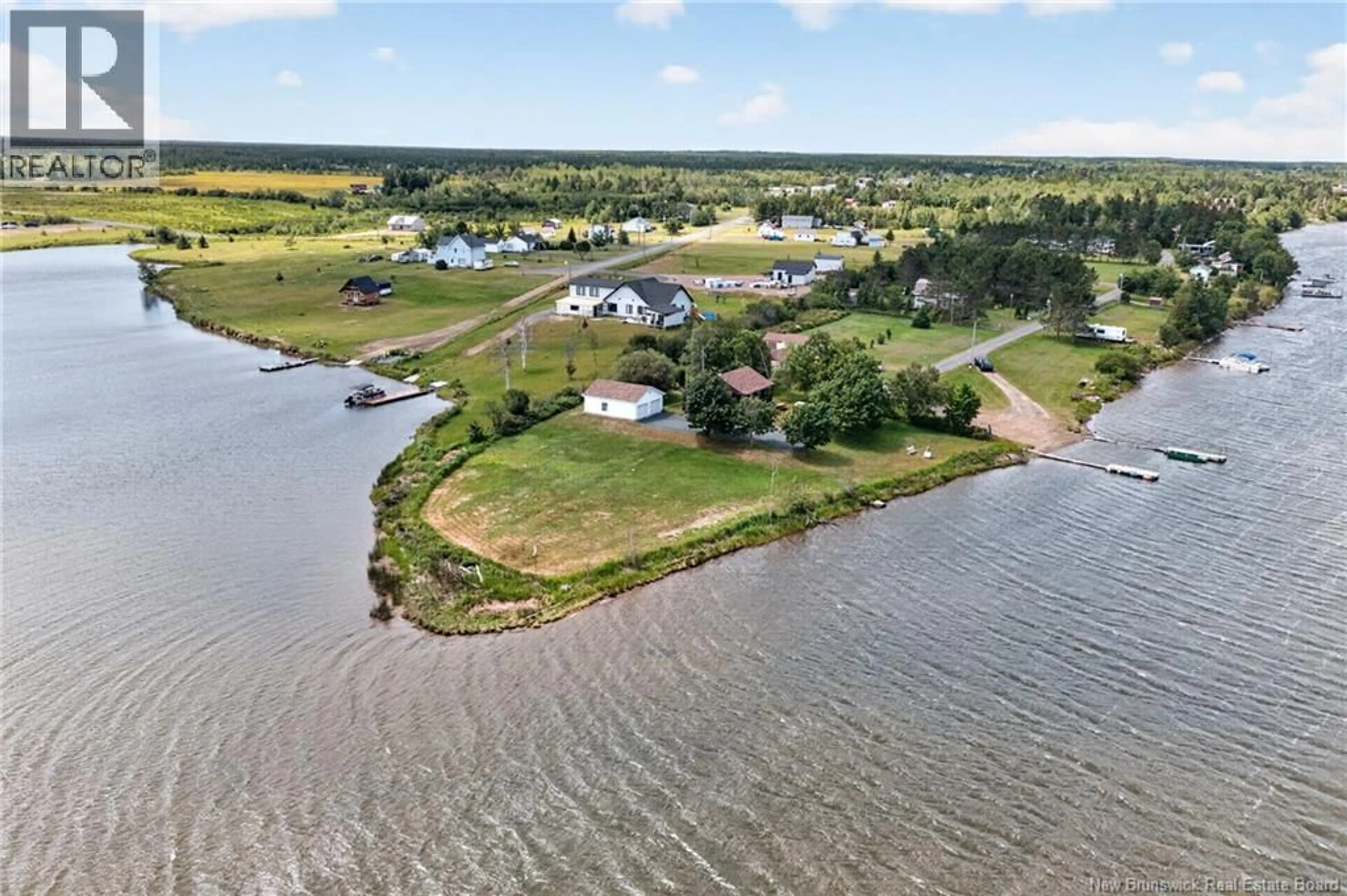 A pic from outside/outdoor area/front of a property/back of a property/a pic from drone, water/lake/river/ocean view for 112 RUE MONICA, Pont-Lafrance New Brunswick E1X4N5