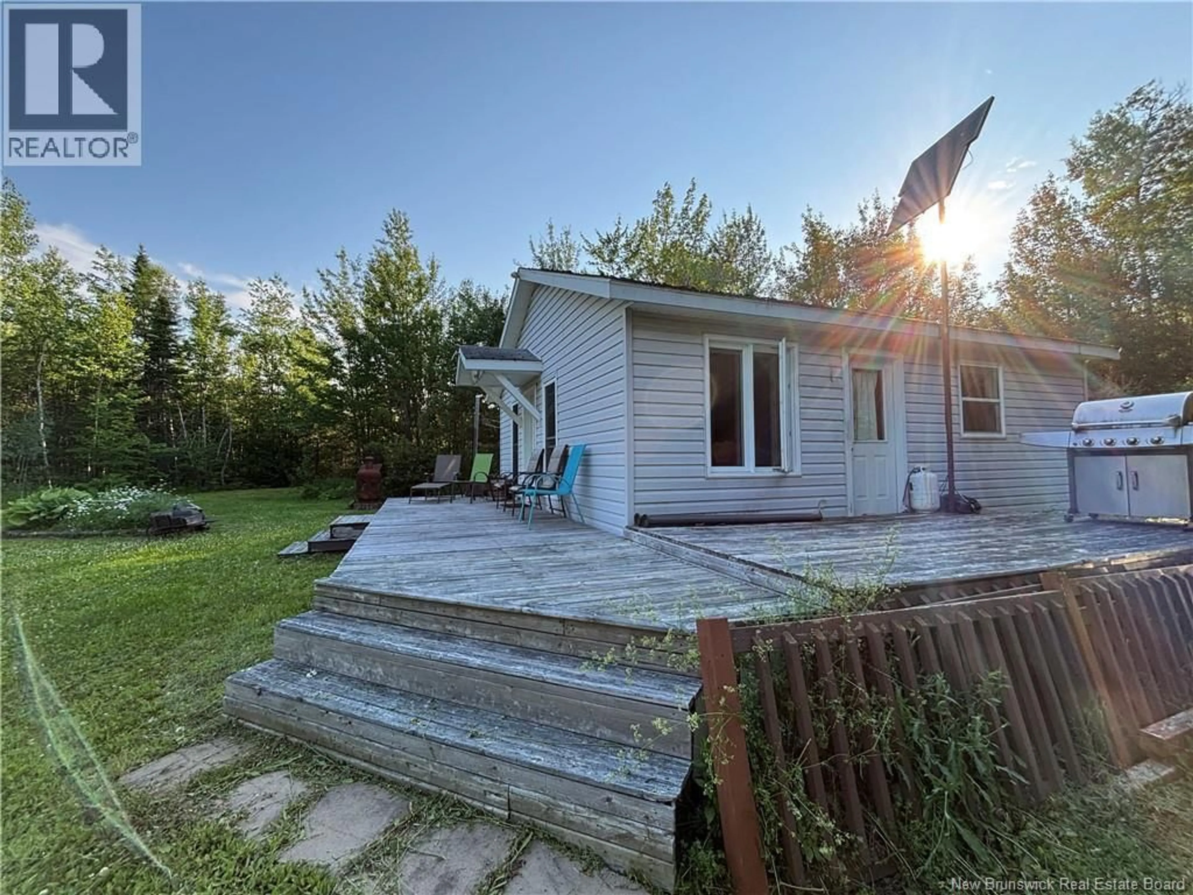 A pic from outside/outdoor area/front of a property/back of a property/a pic from drone, unknown for 848 C+B RUE PRINCIPALE, Beresford New Brunswick E8K2G7