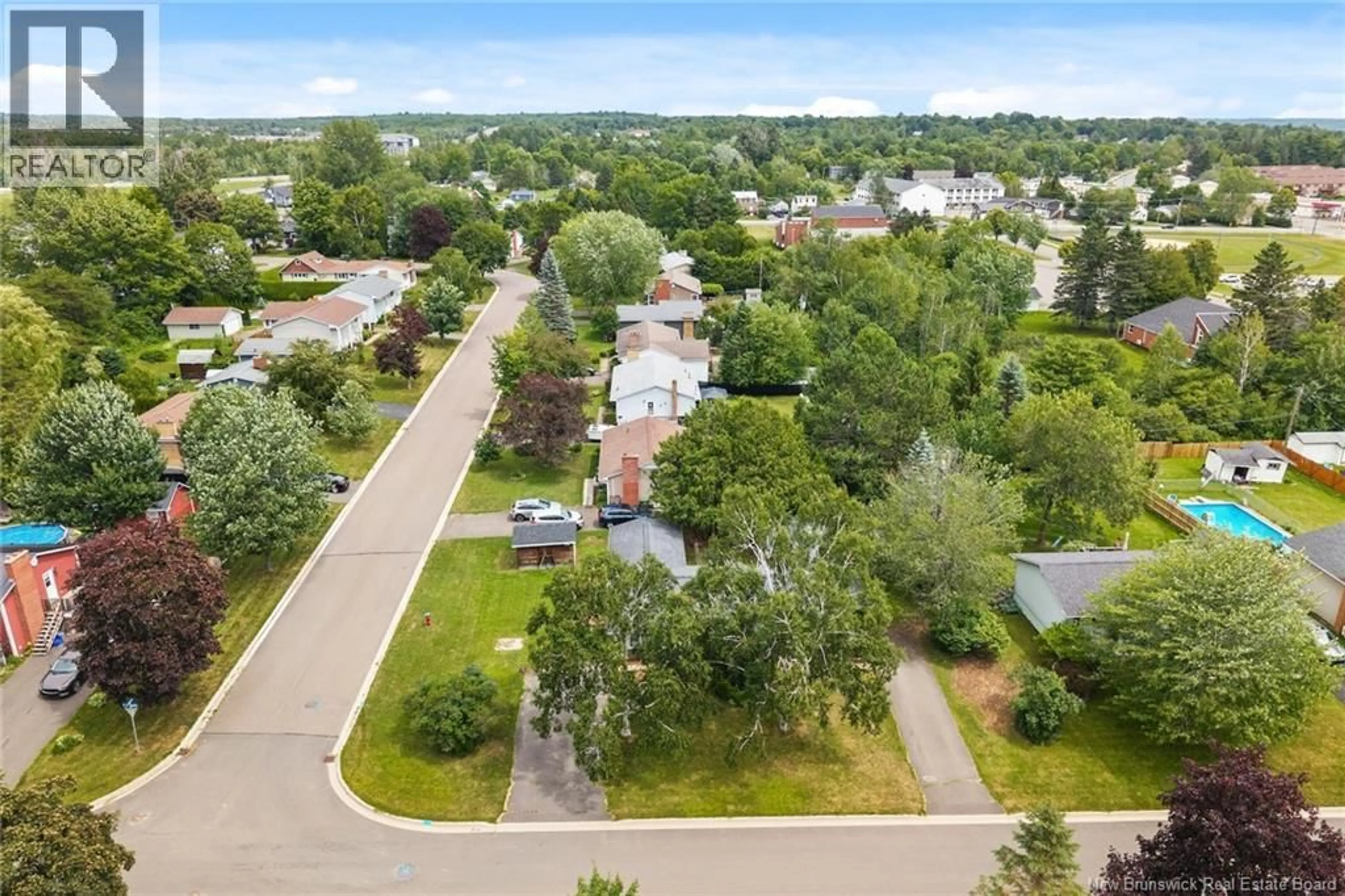 A pic from outside/outdoor area/front of a property/back of a property/a pic from drone, street for 52-54 LOMBARDI LANE, Fredericton New Brunswick E3A1N7