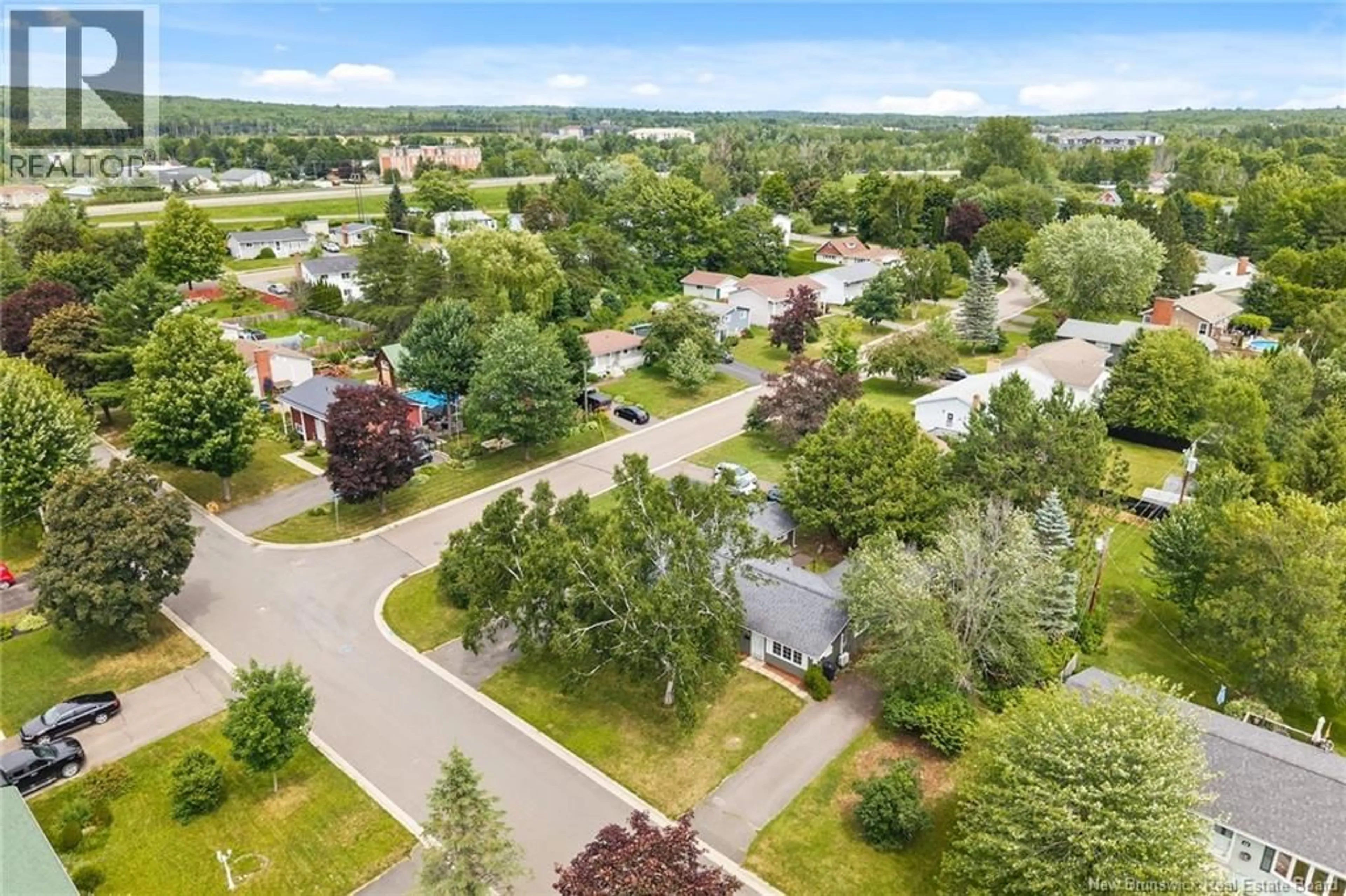 A pic from outside/outdoor area/front of a property/back of a property/a pic from drone, mountain view for 52-54 LOMBARDI LANE, Fredericton New Brunswick E3A1N7