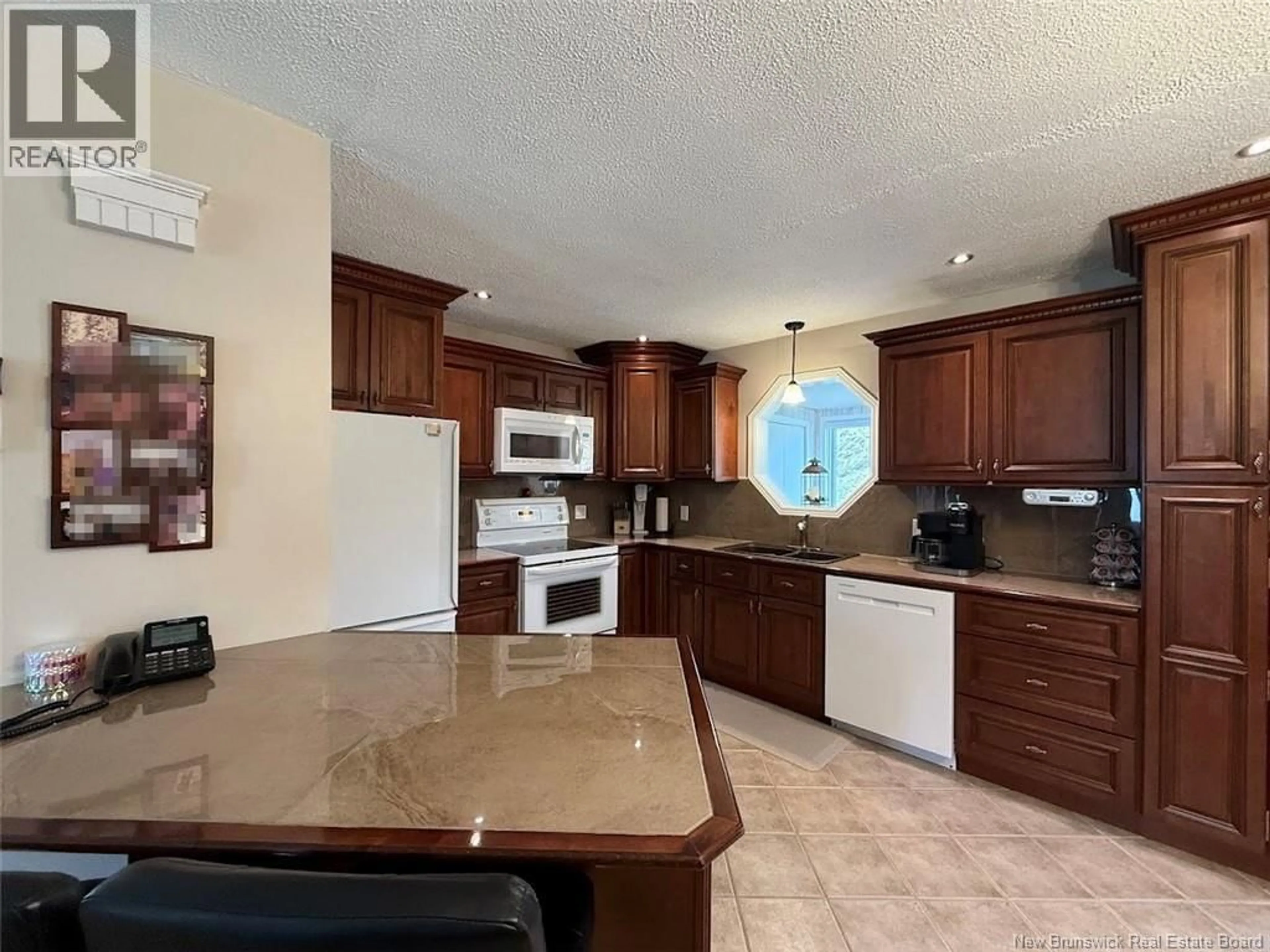 Open concept kitchen, ceramic/tile floor for 128 DE LA POINTE ROAD, Lac Baker New Brunswick E7A1J2
