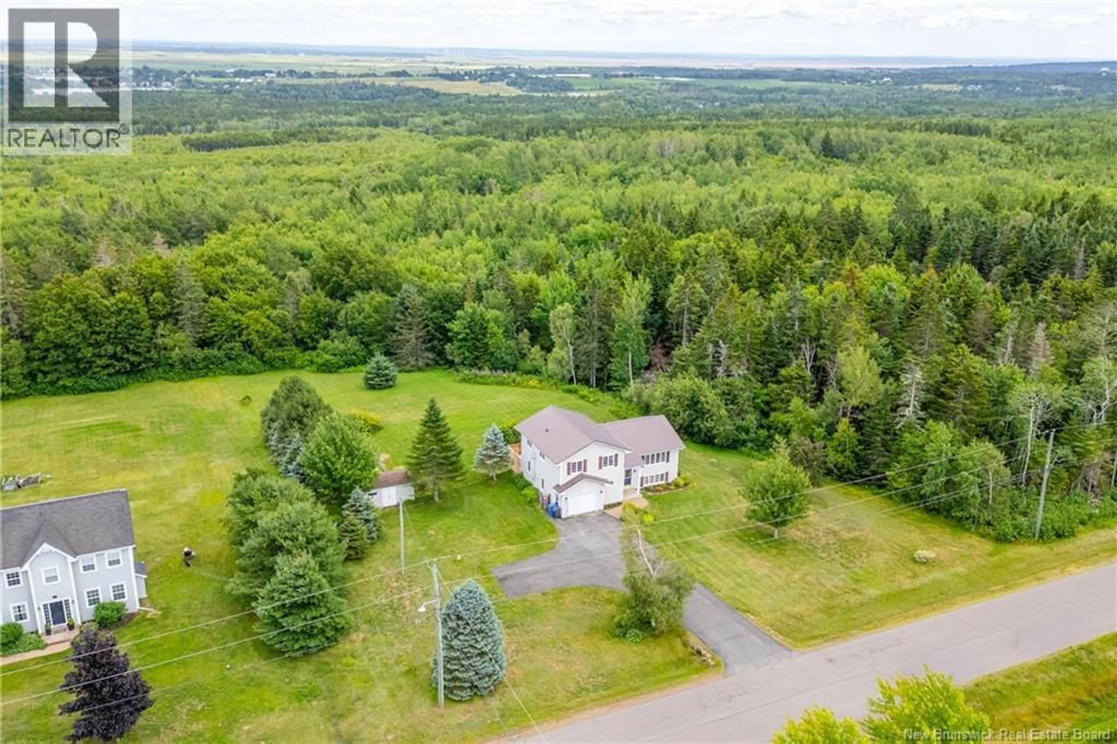 A pic from outside/outdoor area/front of a property/back of a property/a pic from drone, unknown for 26 CARRIAGE COURT, Sackville New Brunswick E4L1B2
