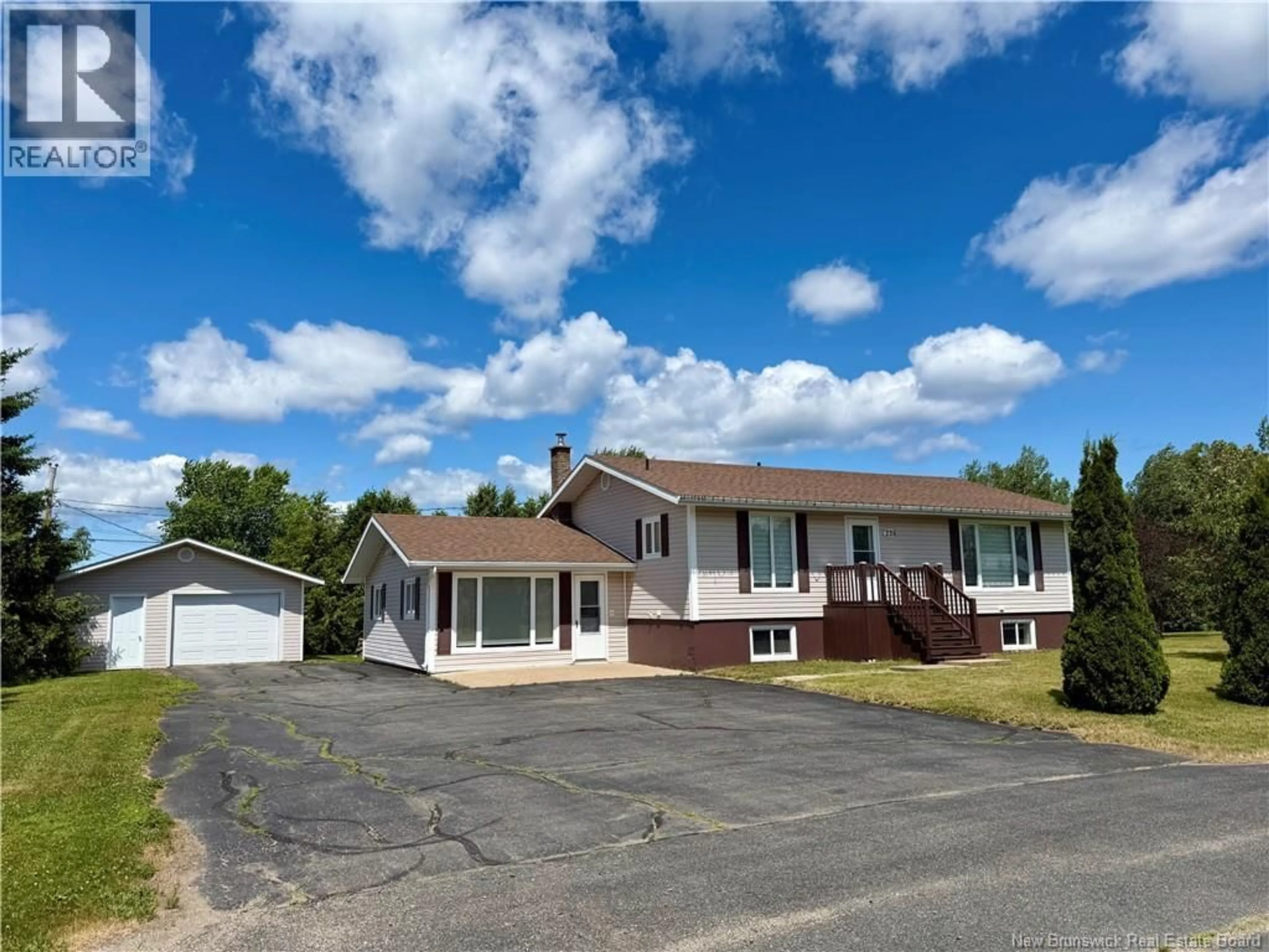 Home with vinyl exterior material, street for 228 FOULEM, Beresford New Brunswick E8K1N3