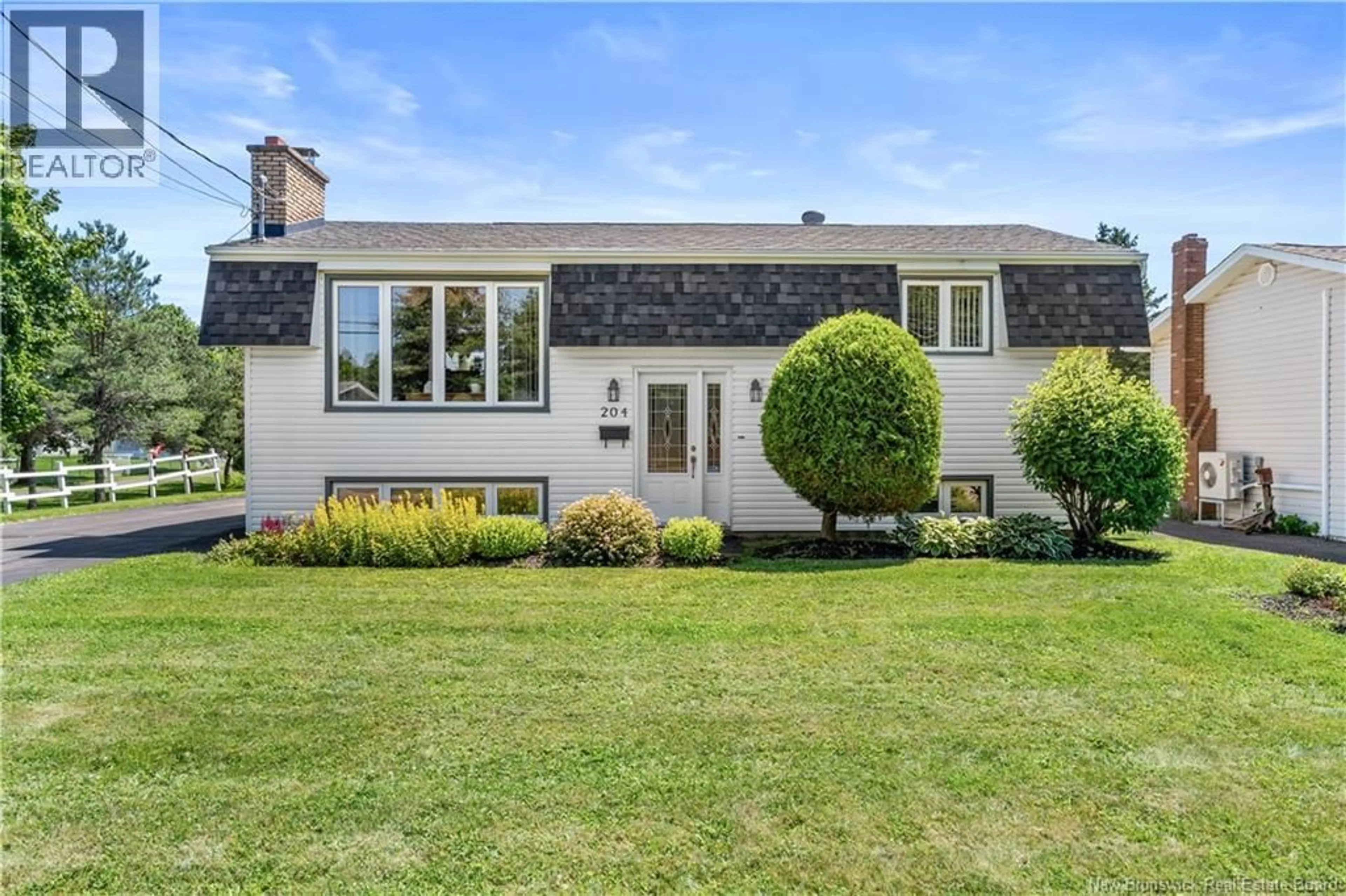 A pic from outside/outdoor area/front of a property/back of a property/a pic from drone, street for 204 THIBODEAU, Dieppe New Brunswick E1A1V5