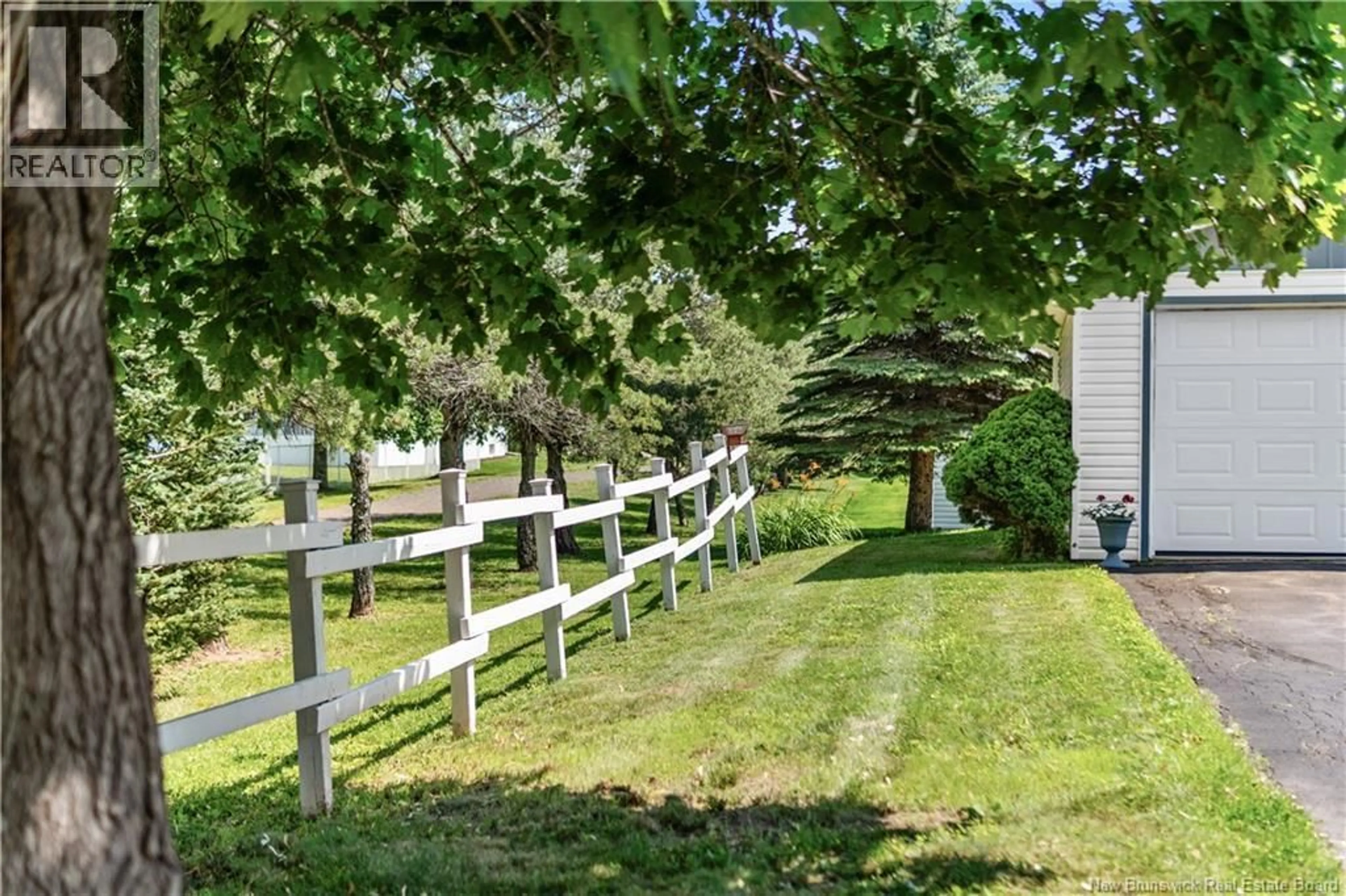 A pic from outside/outdoor area/front of a property/back of a property/a pic from drone, unknown for 204 THIBODEAU, Dieppe New Brunswick E1A1V5