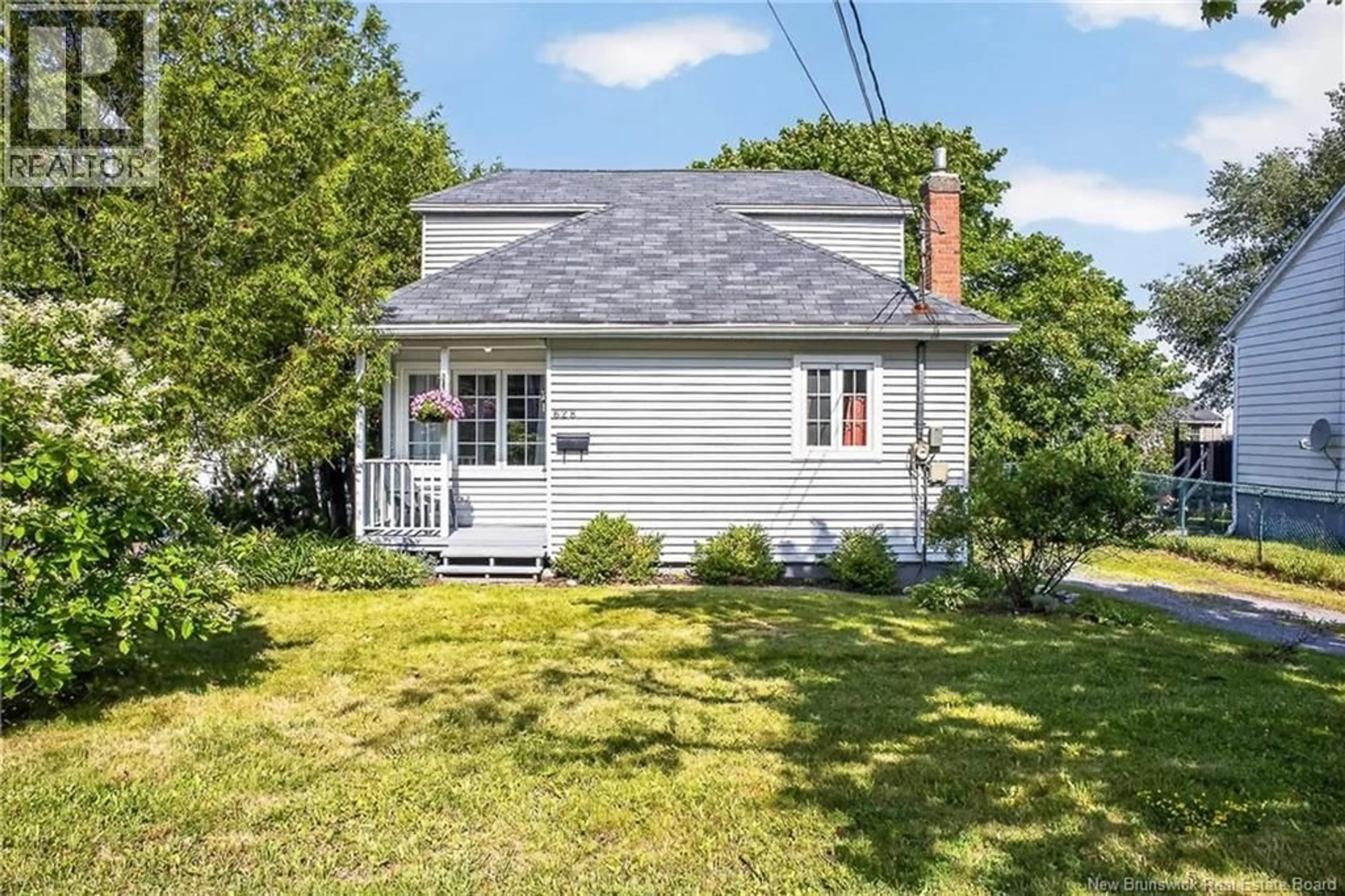 A pic from outside/outdoor area/front of a property/back of a property/a pic from drone, street for 628 SAND COVE ROAD, Saint John New Brunswick E2M3C4